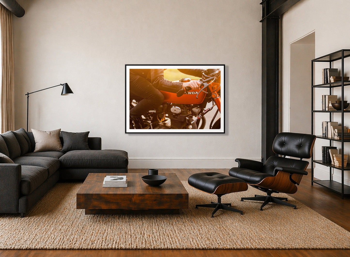 Cafe Costa by Dylan Ozanich in a Black frame, above a dark sectional in a loft with a black leather lounge chair