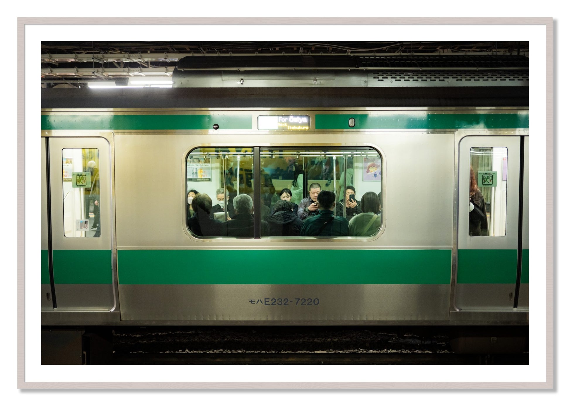 Framed photograph of Commute by Dylan Ozanich, White Maple frame, Borders