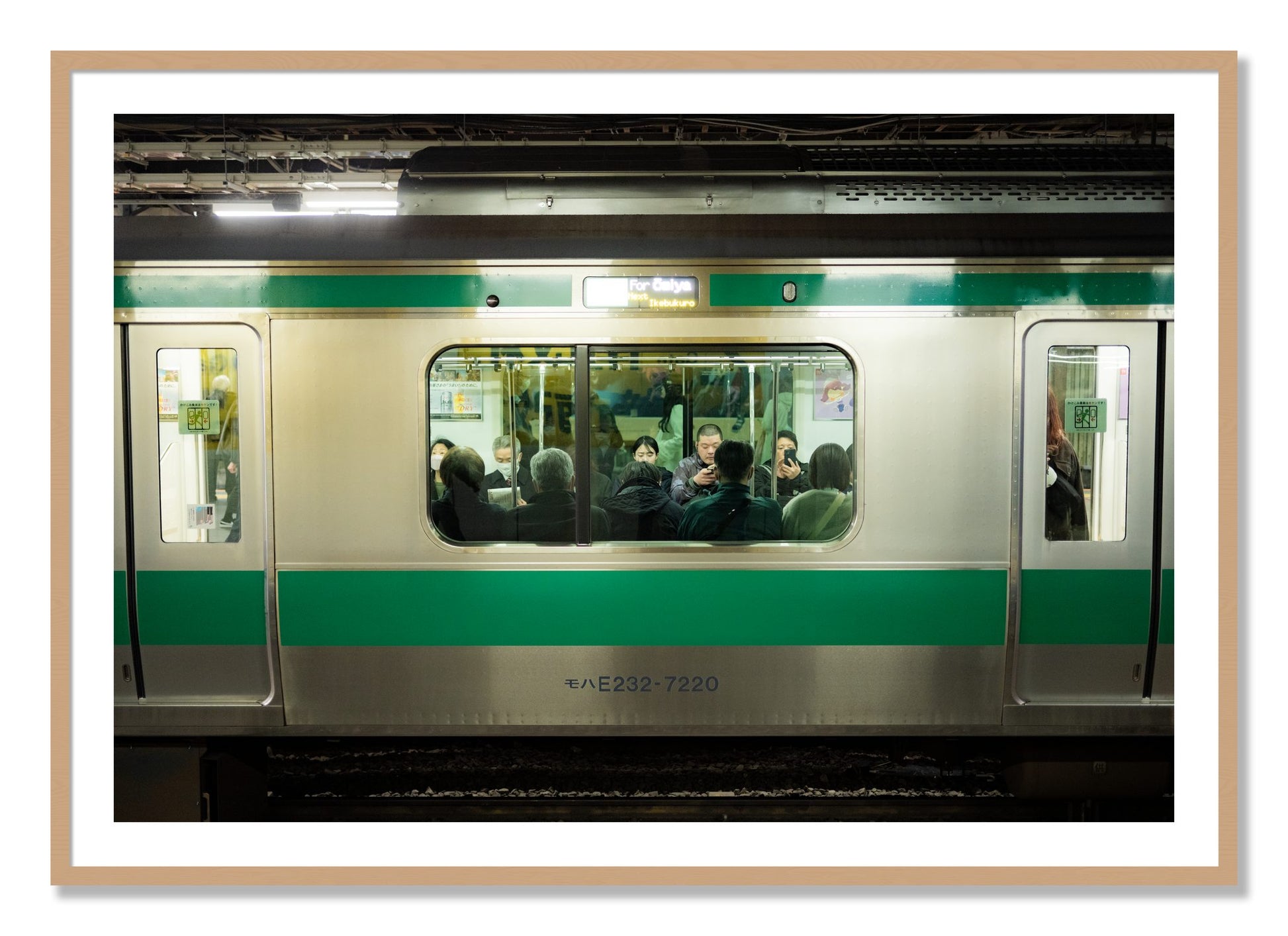 Framed photograph of Commute by Dylan Ozanich, Oak frame, Borders