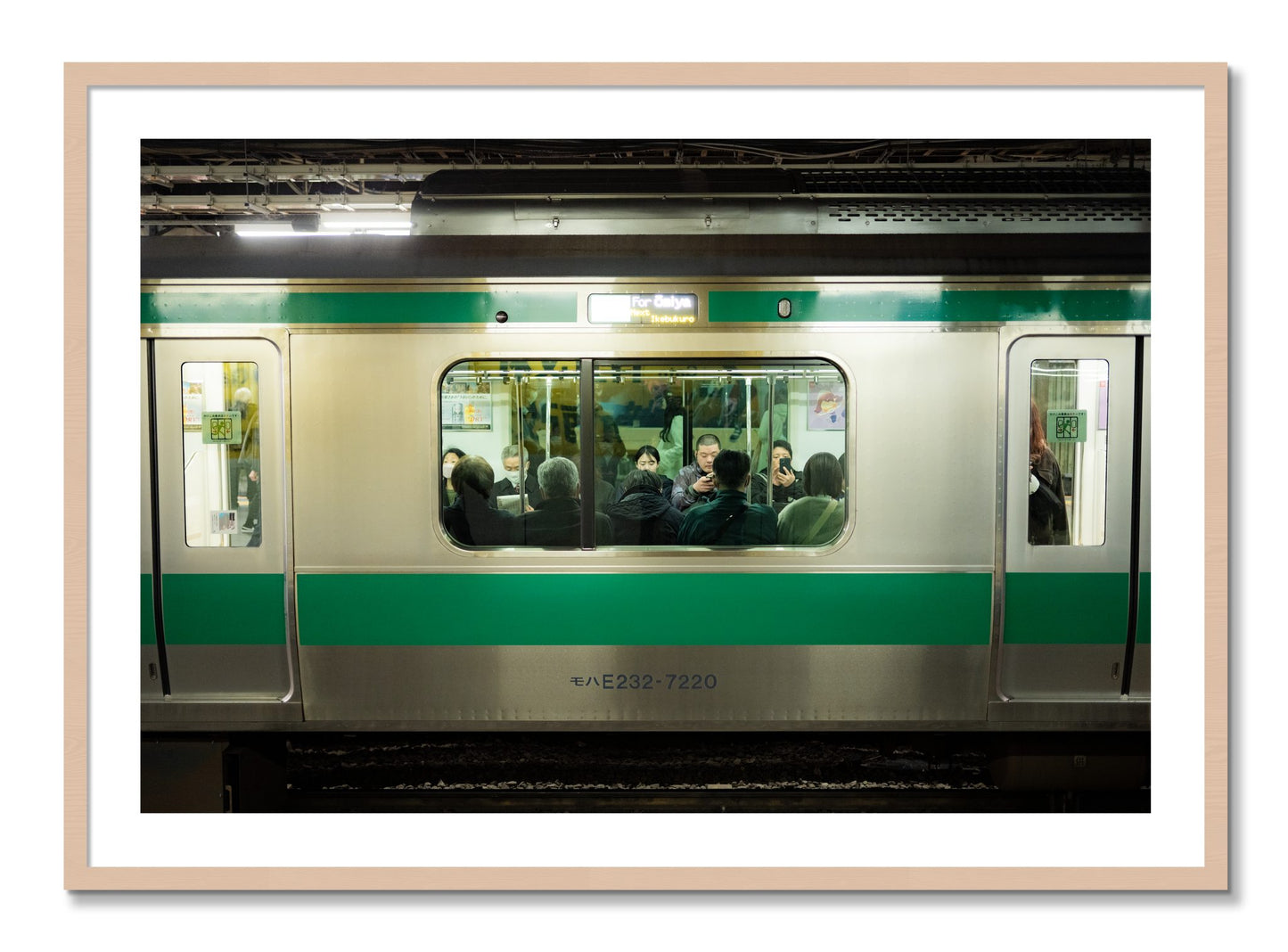 Framed photograph of Commute by Dylan Ozanich, Maple frame, Borders