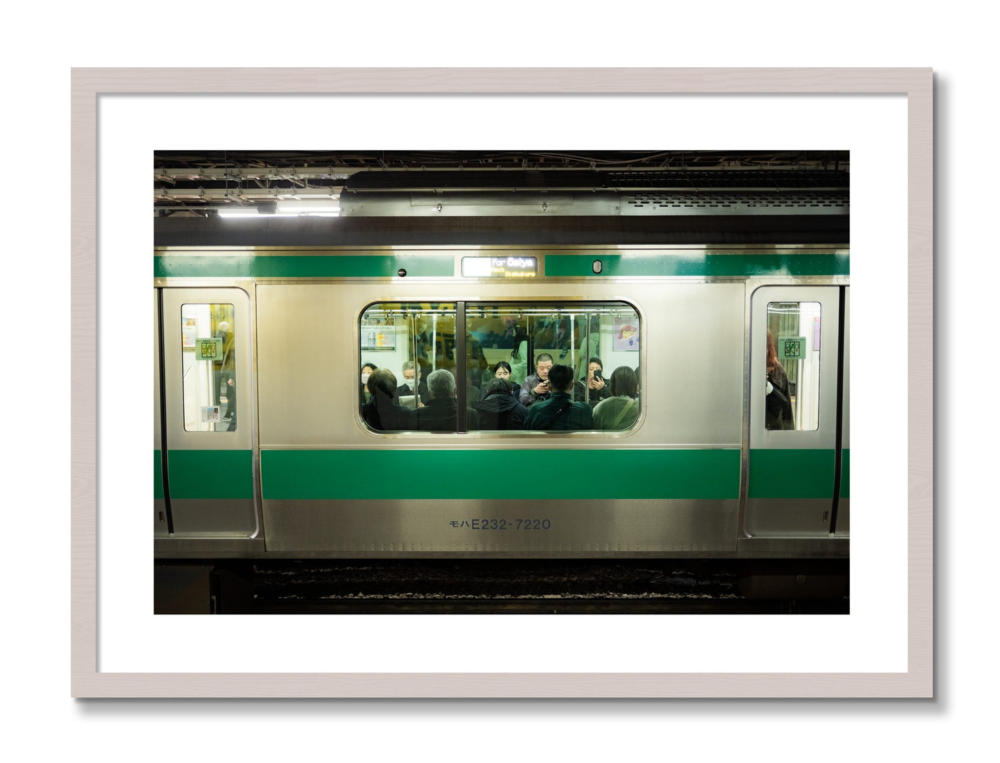 Framed photograph of Commute by Dylan Ozanich, White Maple frame, Borders