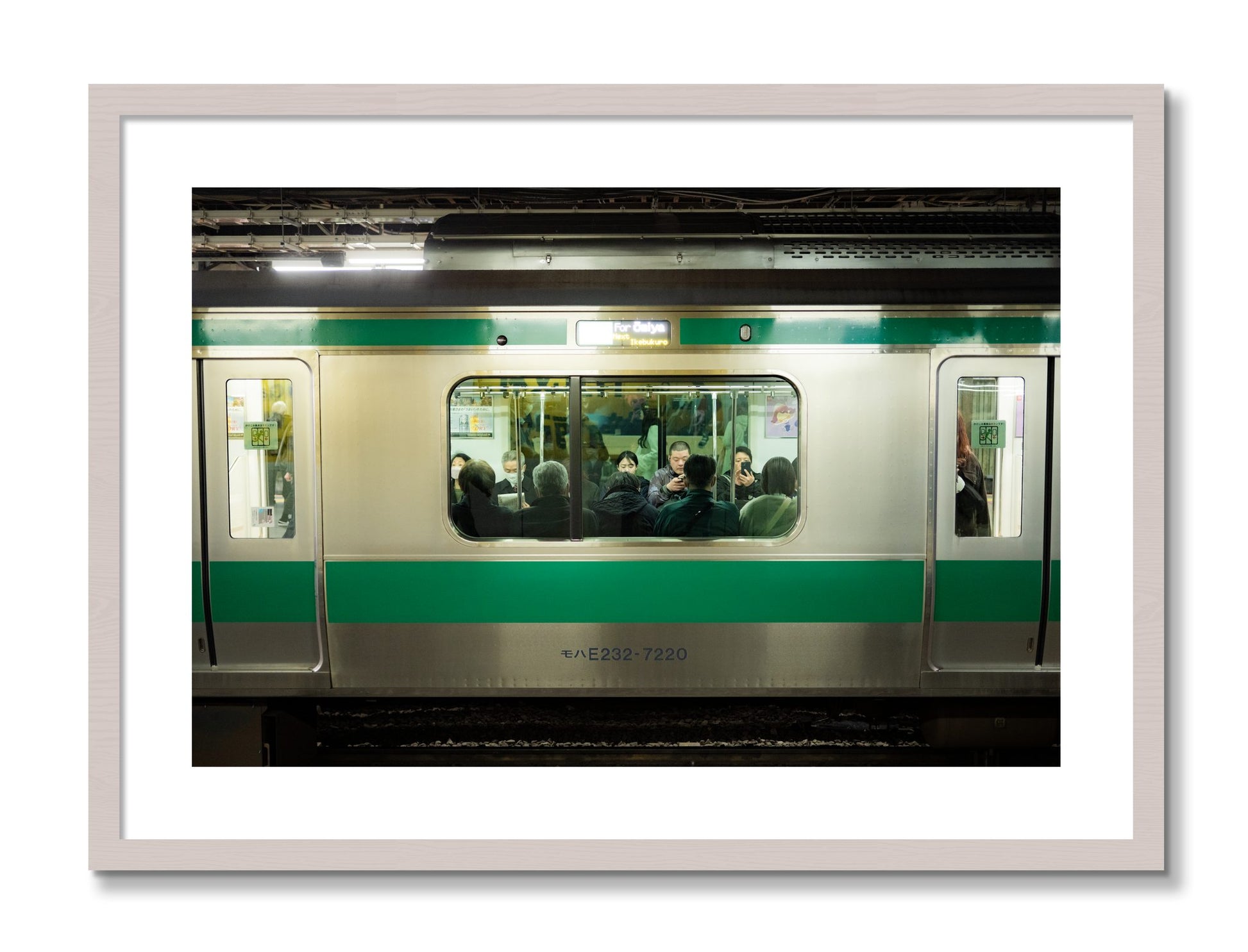 Framed photograph of Commute by Dylan Ozanich, White Maple frame, Borders