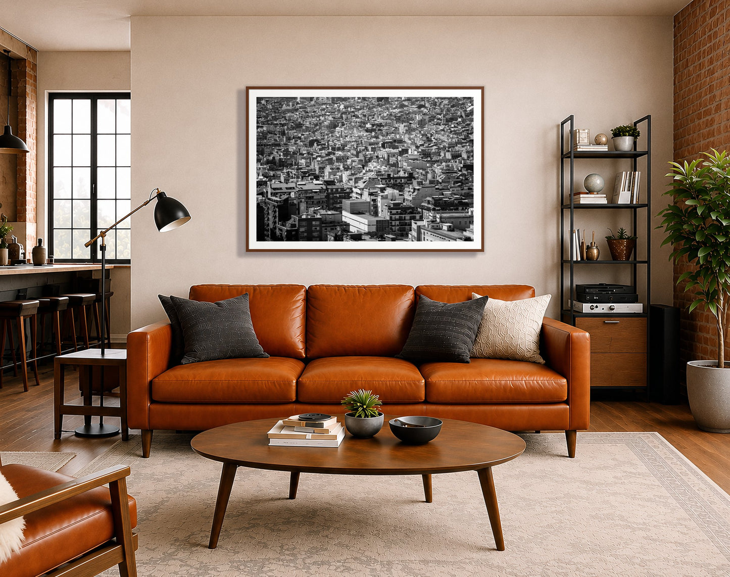 Coompressed by Dylan Ozanich in a Walnut frame, above a cognac leather sofa in a brick loft