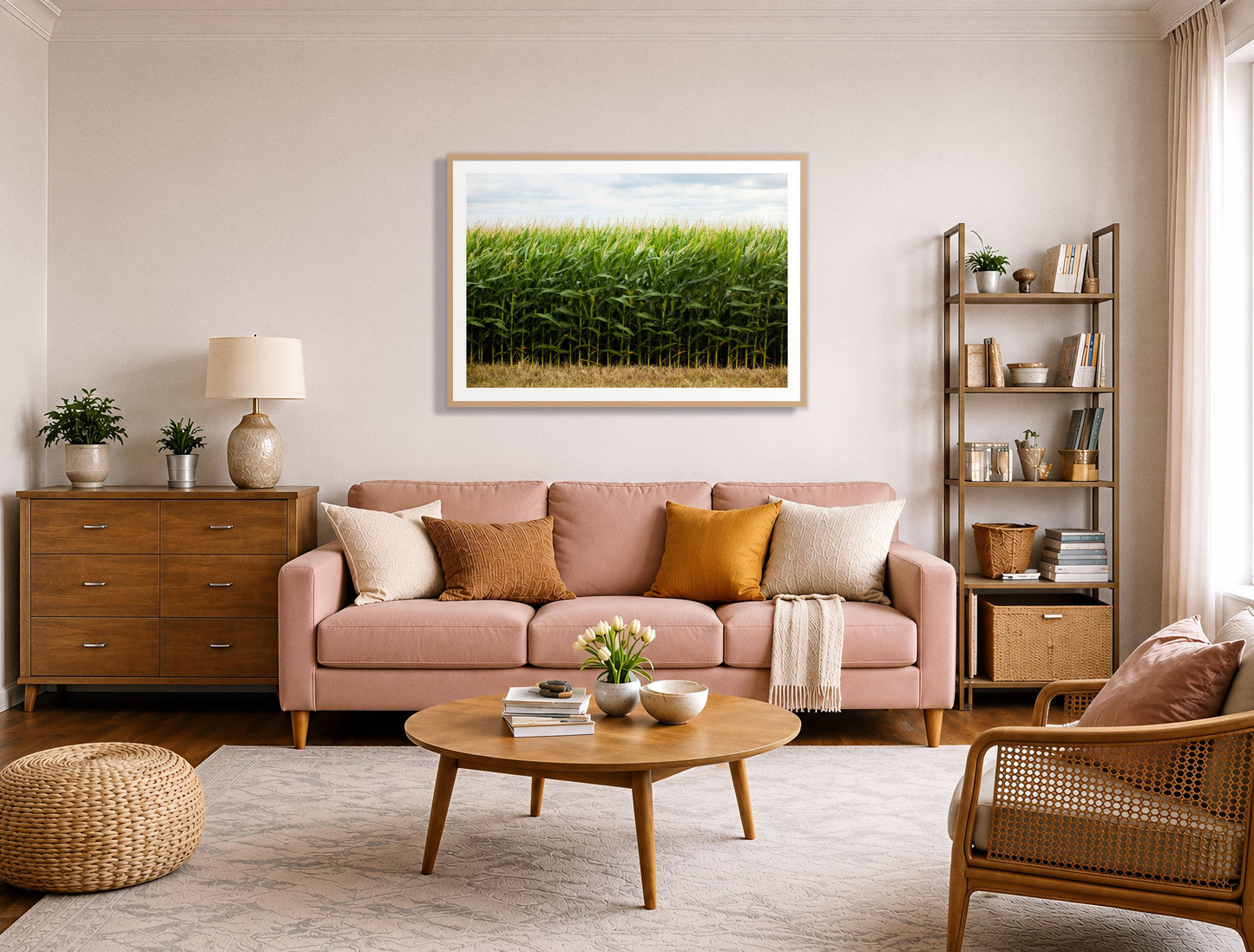 Corn Crop by Dylan Ozanich in an Oak frame, above a blush pink sofa in a warm, eclectic living room