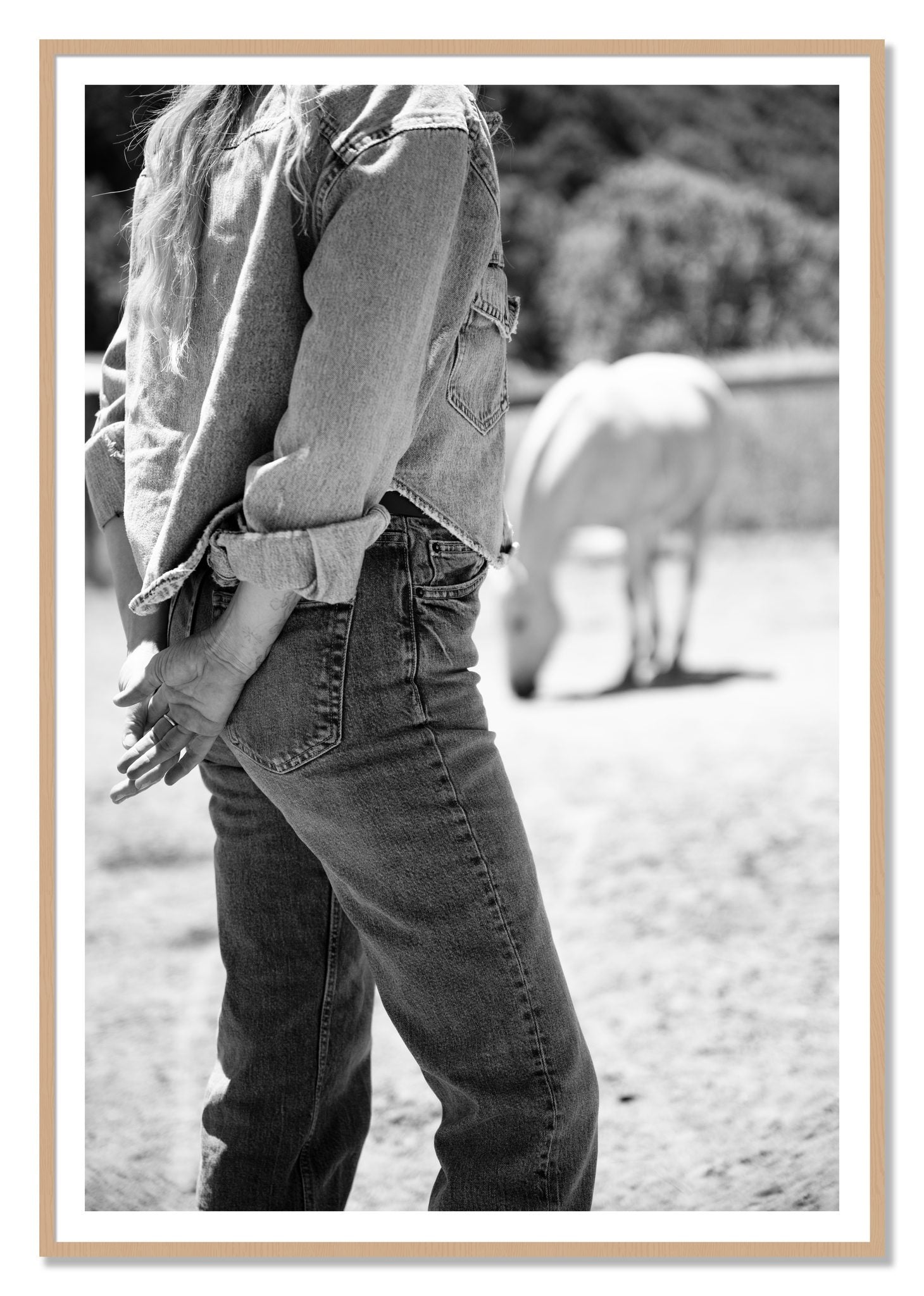 Cowgirl by Dylan Ozanich, 48×72 print with a White Border in an Oak frame