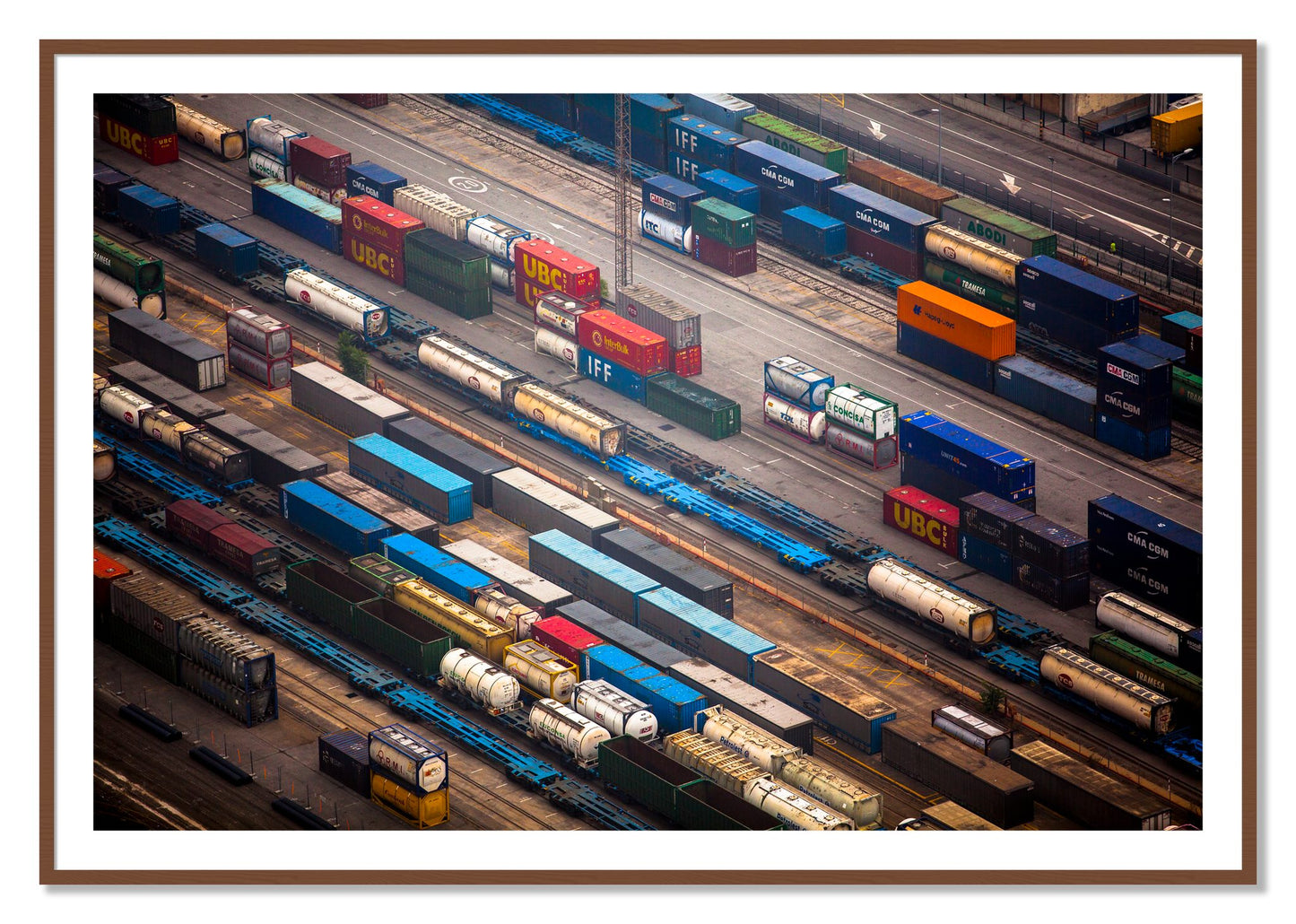 Framed photograph of Distribute by Dylan Ozanich, Walnut frame, Borders