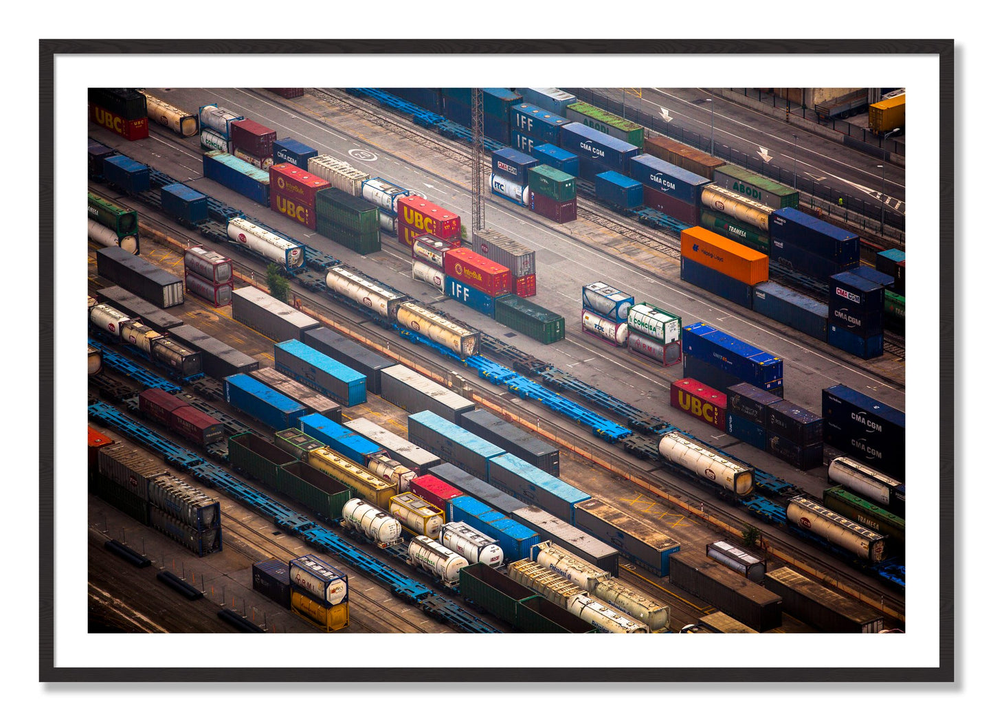 Framed photograph of Distribute by Dylan Ozanich, Black Walnut frame, Borders