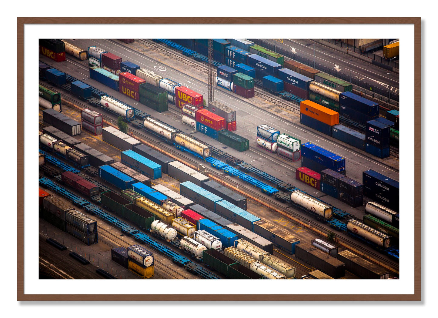 Framed photograph of Distribute by Dylan Ozanich, Walnut frame, Borders
