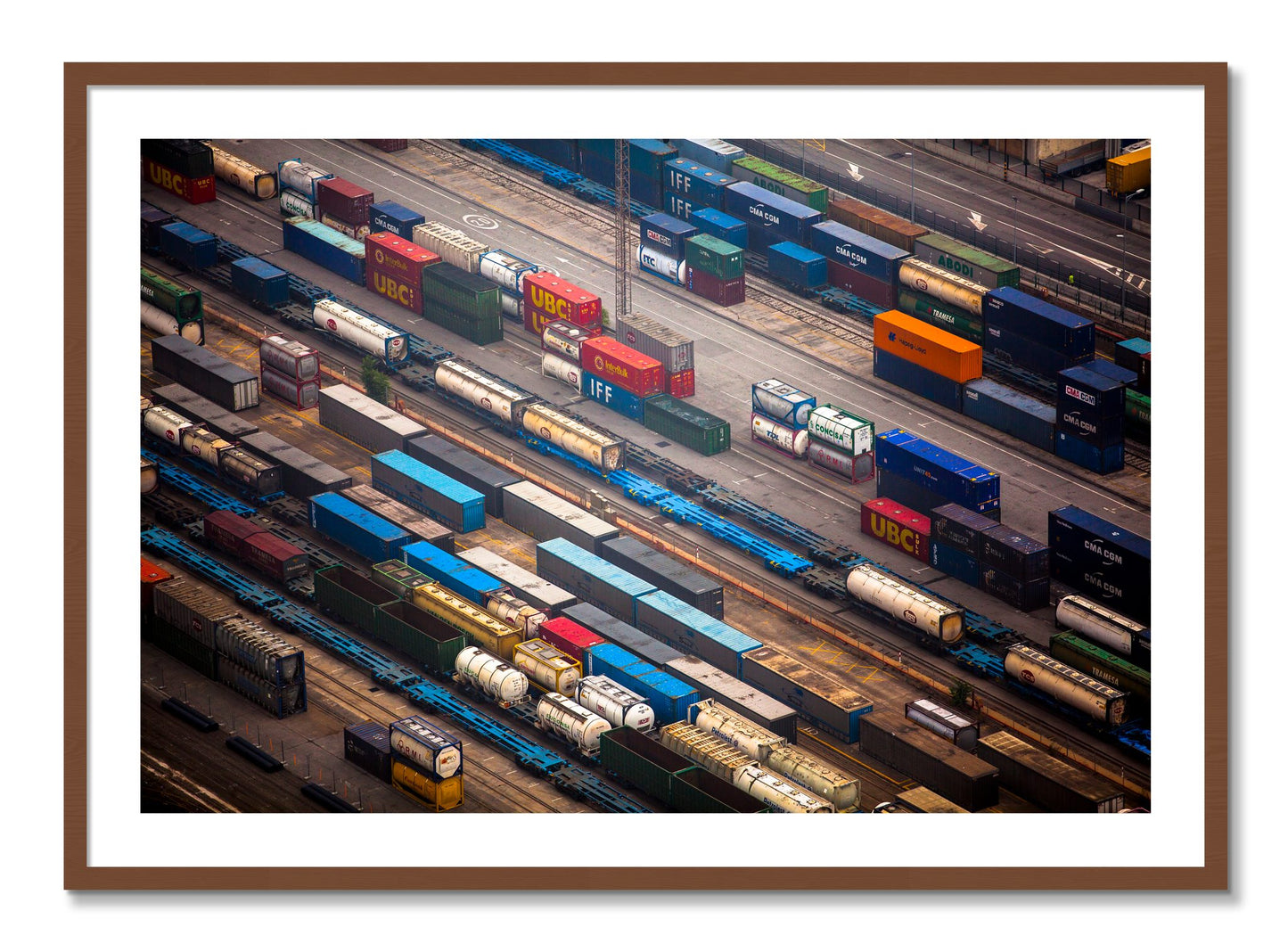Framed photograph of Distribute by Dylan Ozanich, Walnut frame, Borders