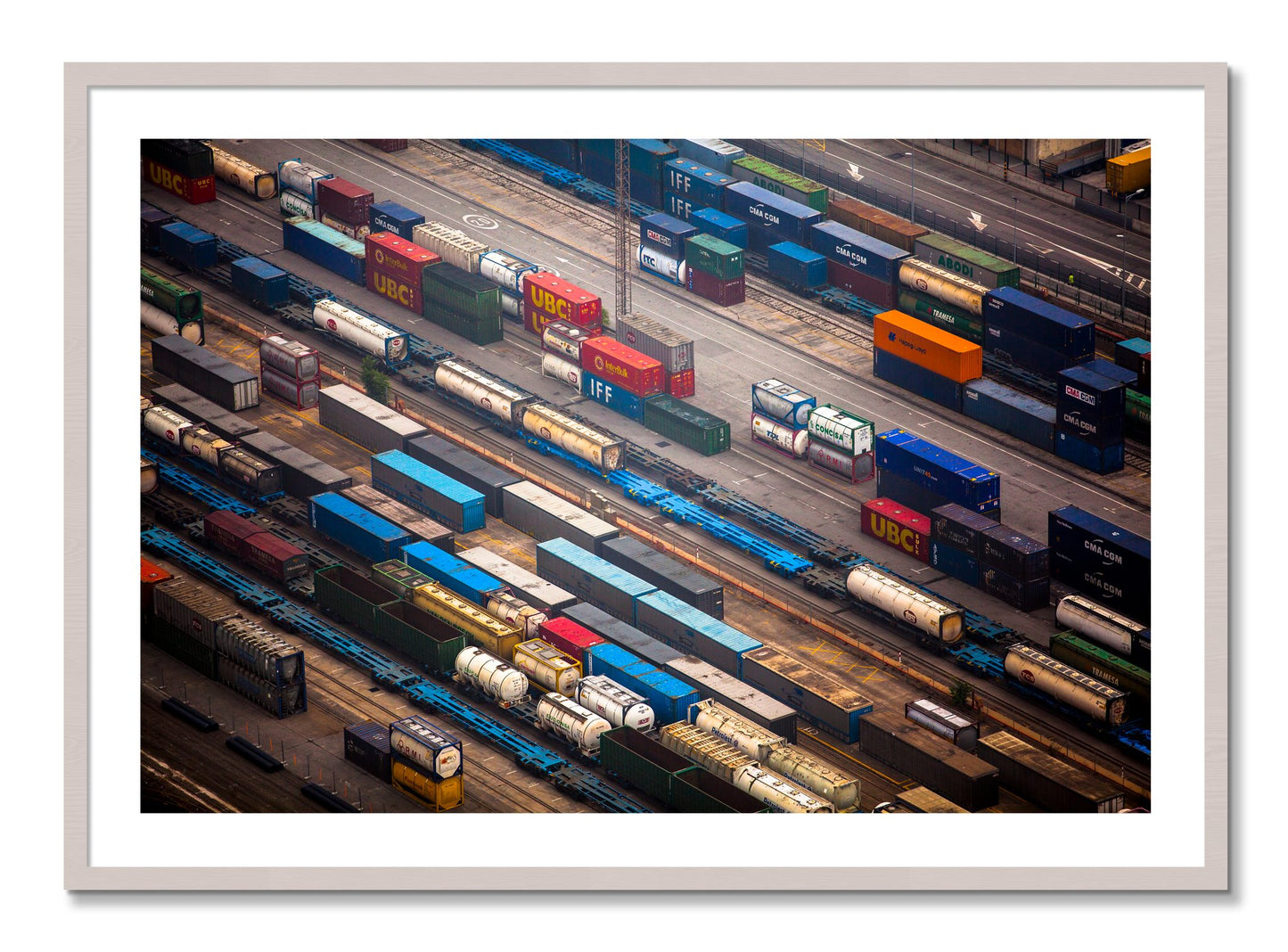 Framed photograph of Distribute by Dylan Ozanich, White Maple frame, Borders