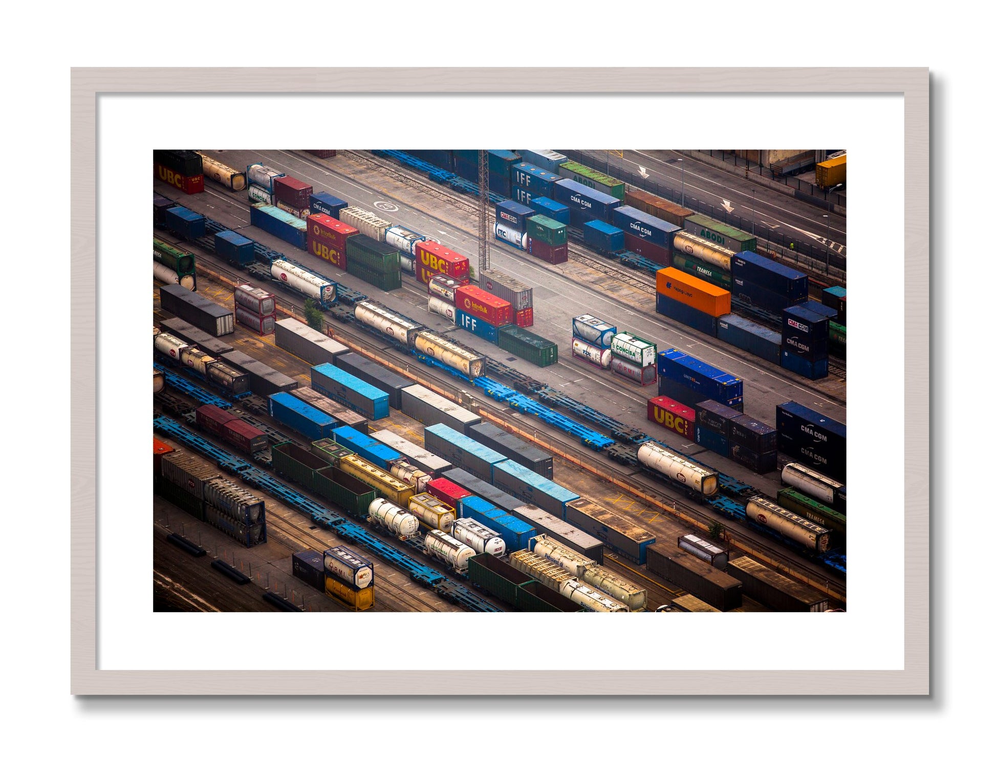 Framed photograph of Distribute by Dylan Ozanich, White Maple frame, Borders