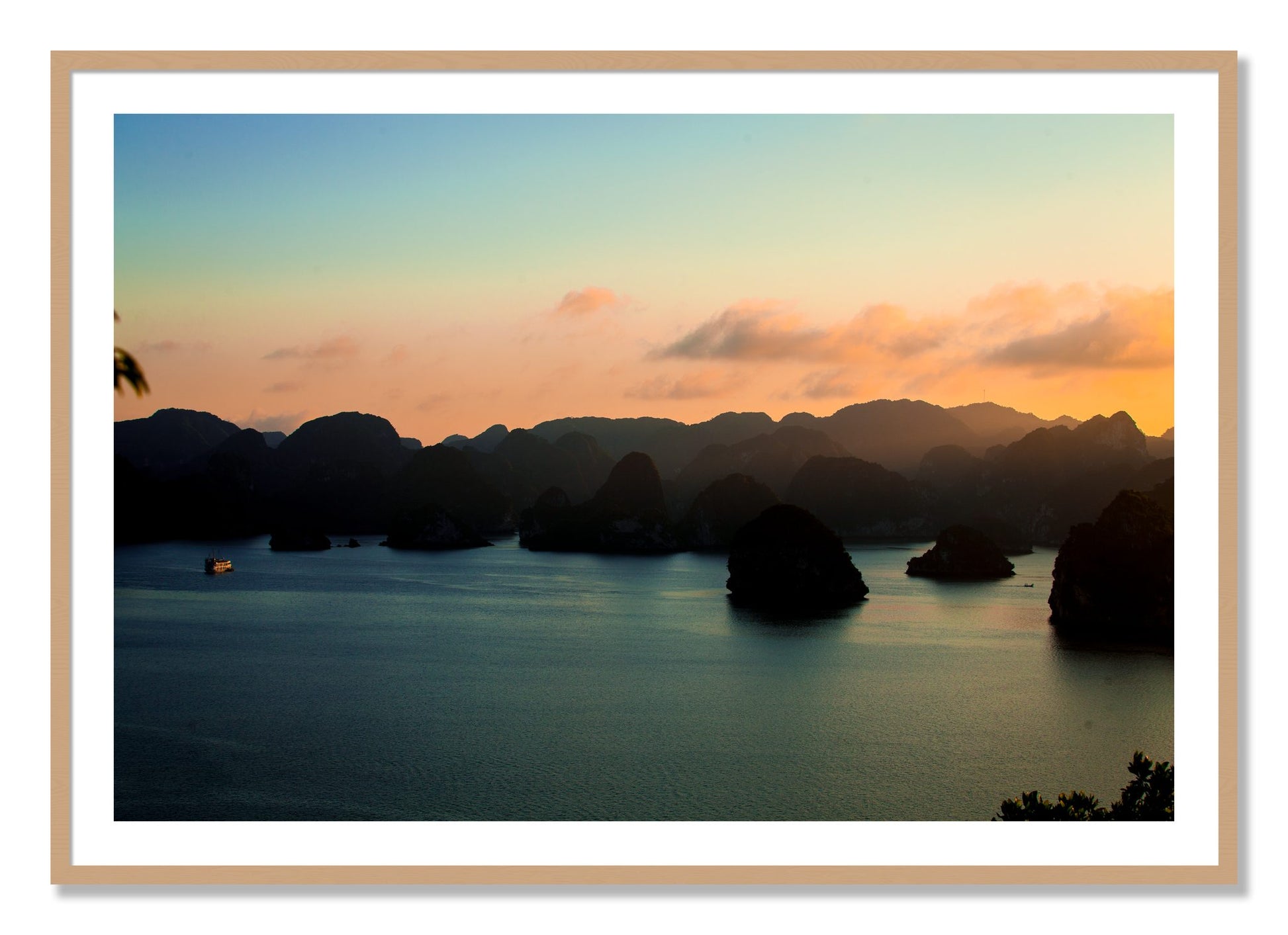 Framed photograph of Dusk At Sea by Dylan Ozanich, Oak frame, Borders