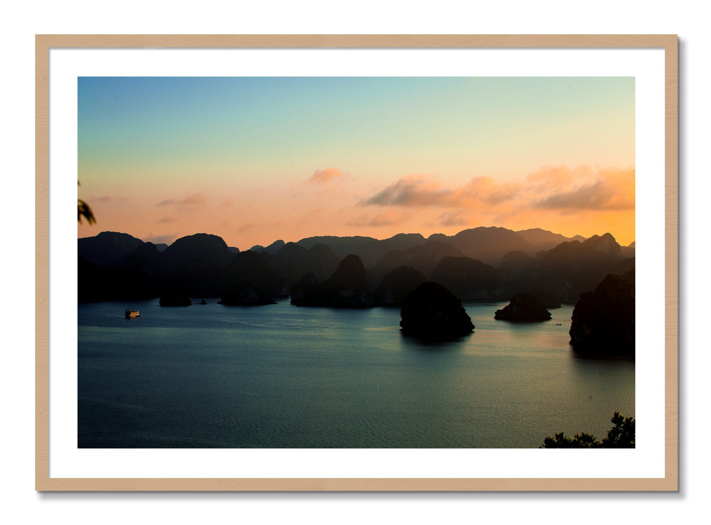 Framed photograph of Dusk At Sea by Dylan Ozanich, Oak frame, Borders