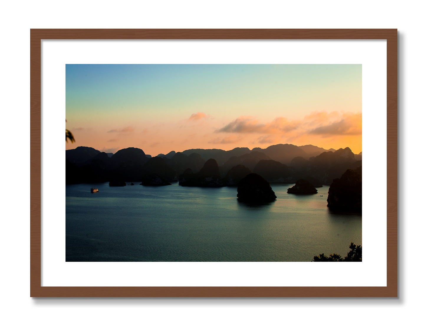 Framed photograph of Dusk At Sea by Dylan Ozanich, Walnut frame, Borders