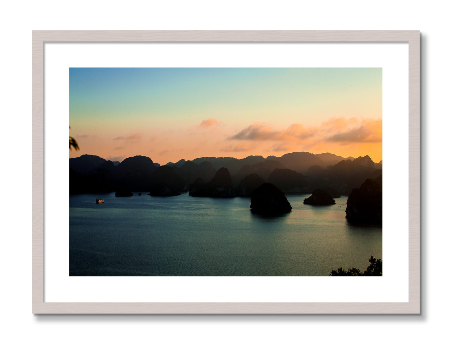 Framed photograph of Dusk At Sea by Dylan Ozanich, White Maple frame, Borders