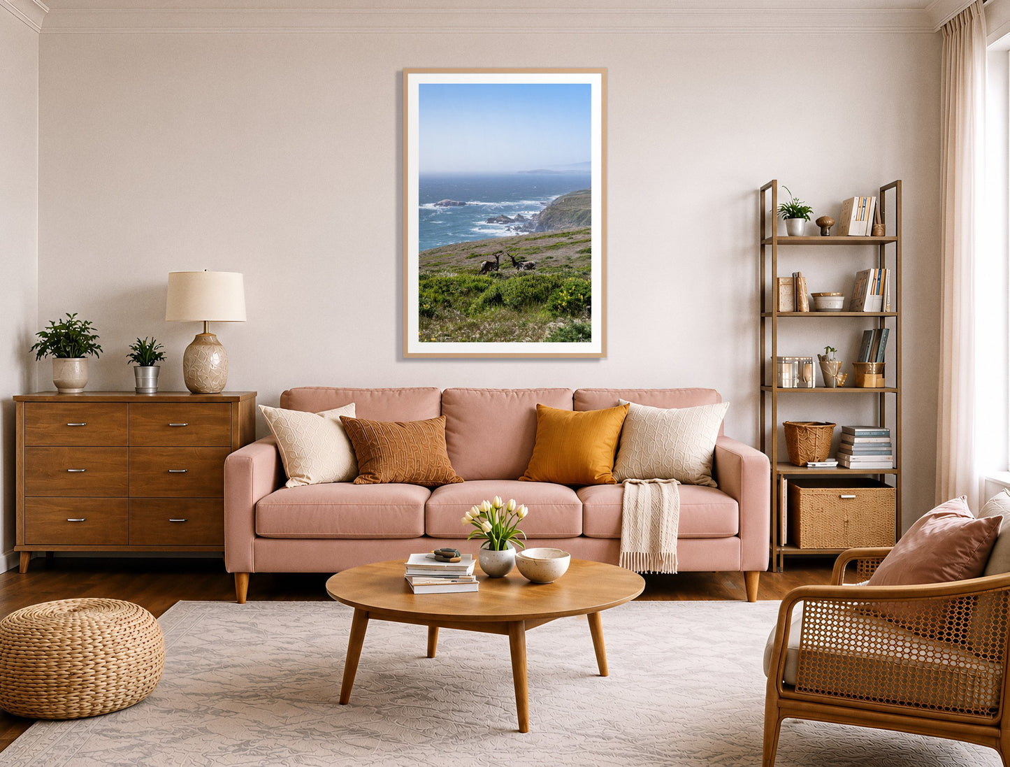 Elk On The Bluff by Dylan Ozanich in an Oak frame, above a blush pink sofa in a warm, eclectic living room