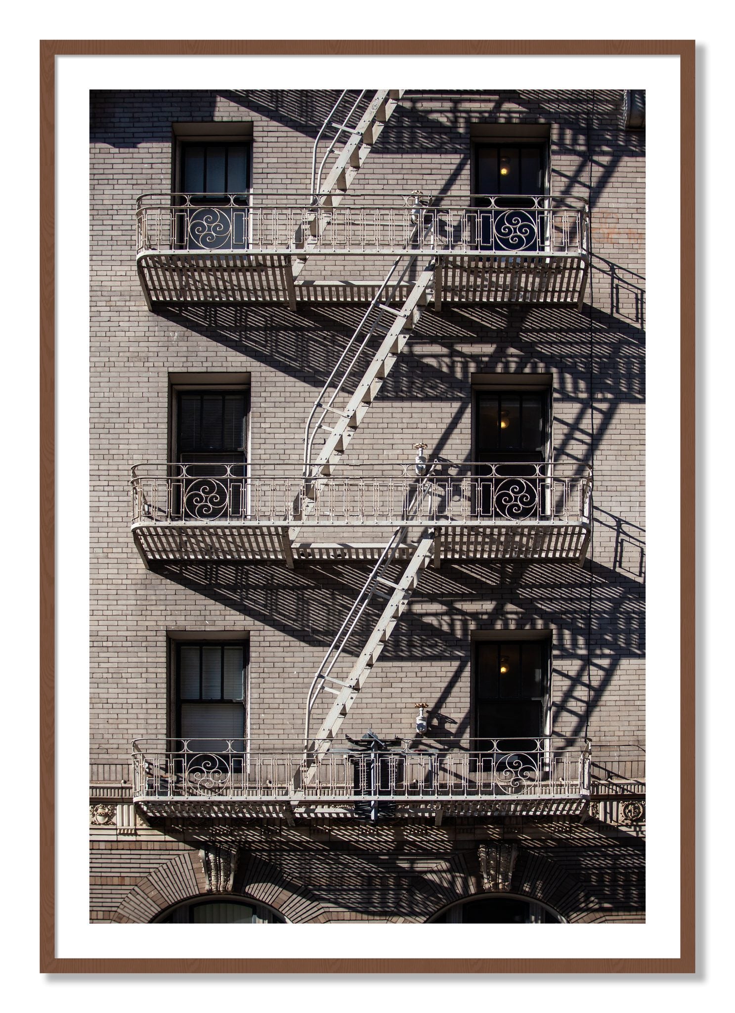 Framed photograph of Escape by Dylan Ozanich, Walnut frame, Borders