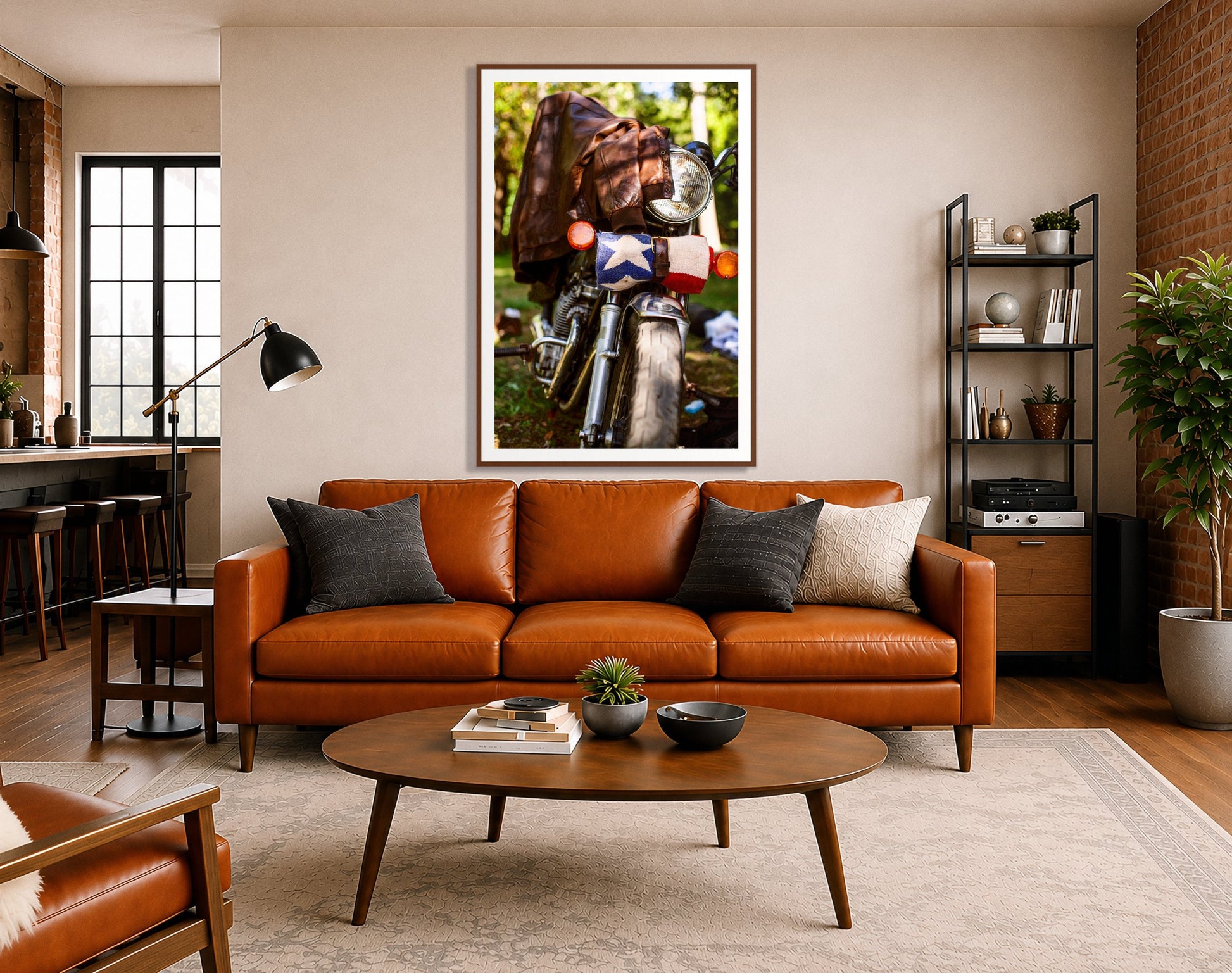 Finding Main Street by Dylan Ozanich in a Walnut frame, above a cognac leather sofa in a brick loft