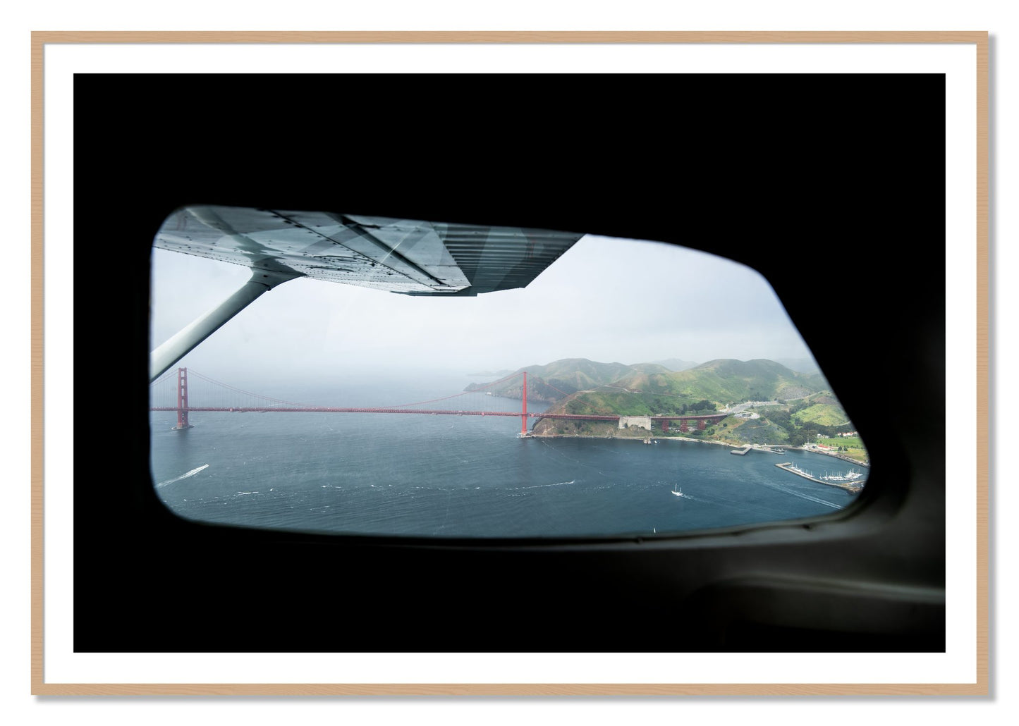 Framed photograph of Flying Over The Gate by Dylan Ozanich, Oak frame, Borders