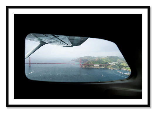 Framed photograph of Flying Over The Gate by Dylan Ozanich, Black frame, Borders