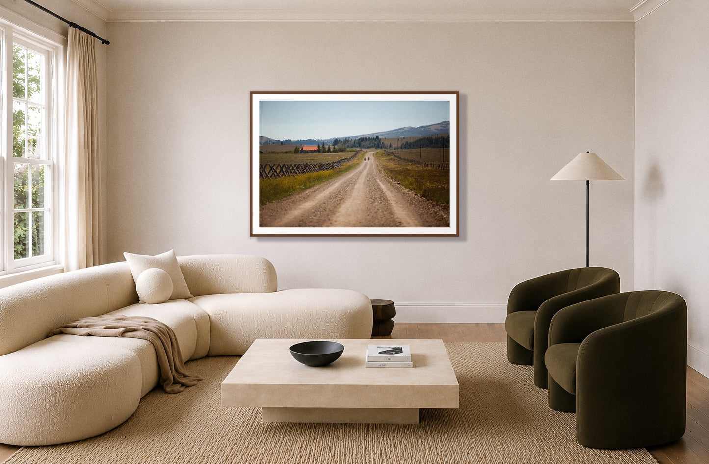 Get Lost by Dylan Ozanich in a Walnut frame, above a cream curved sofa in a living room with olive velvet armchairs