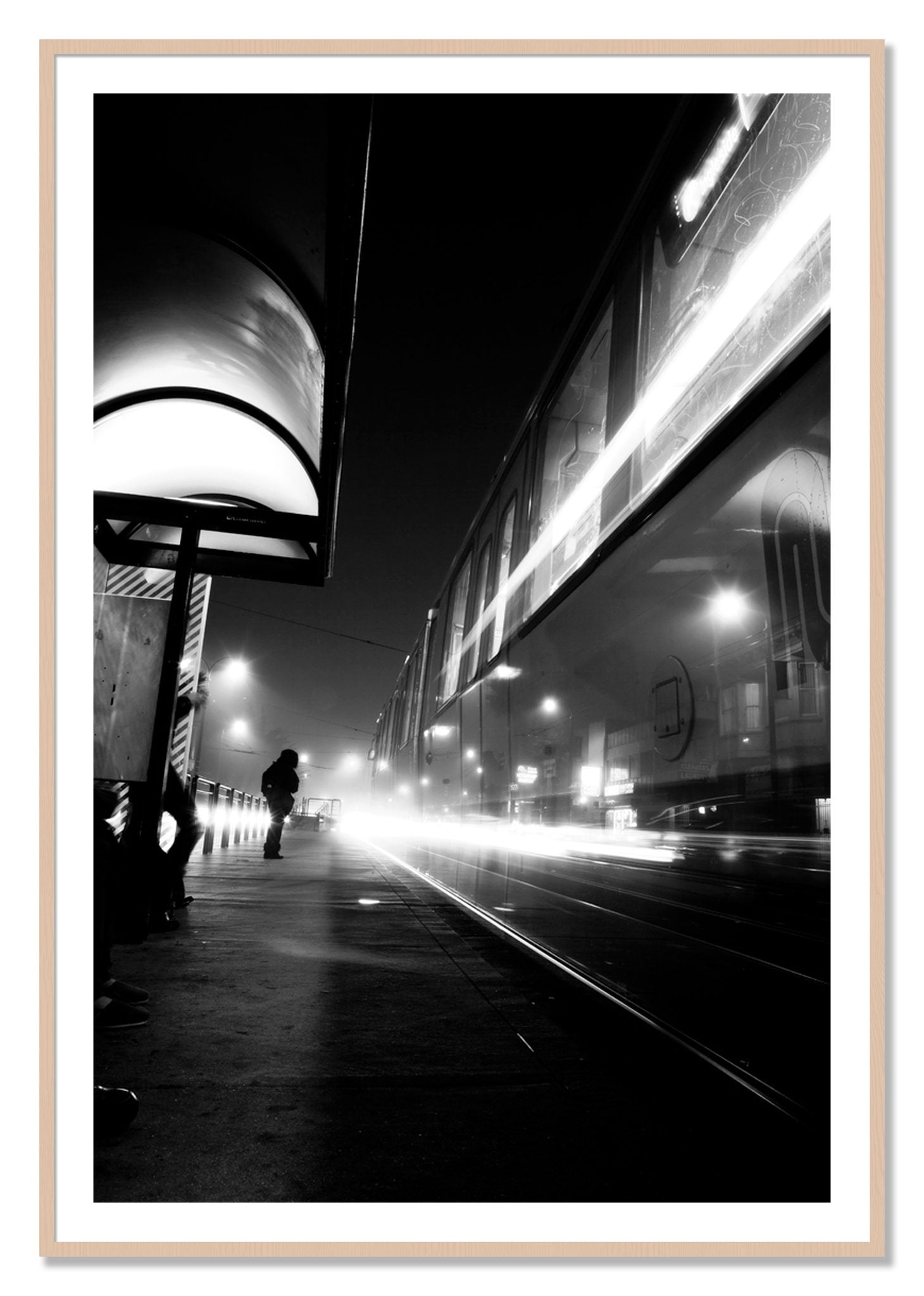 Framed photograph of Ghost Train by Dylan Ozanich, Maple frame, Borders