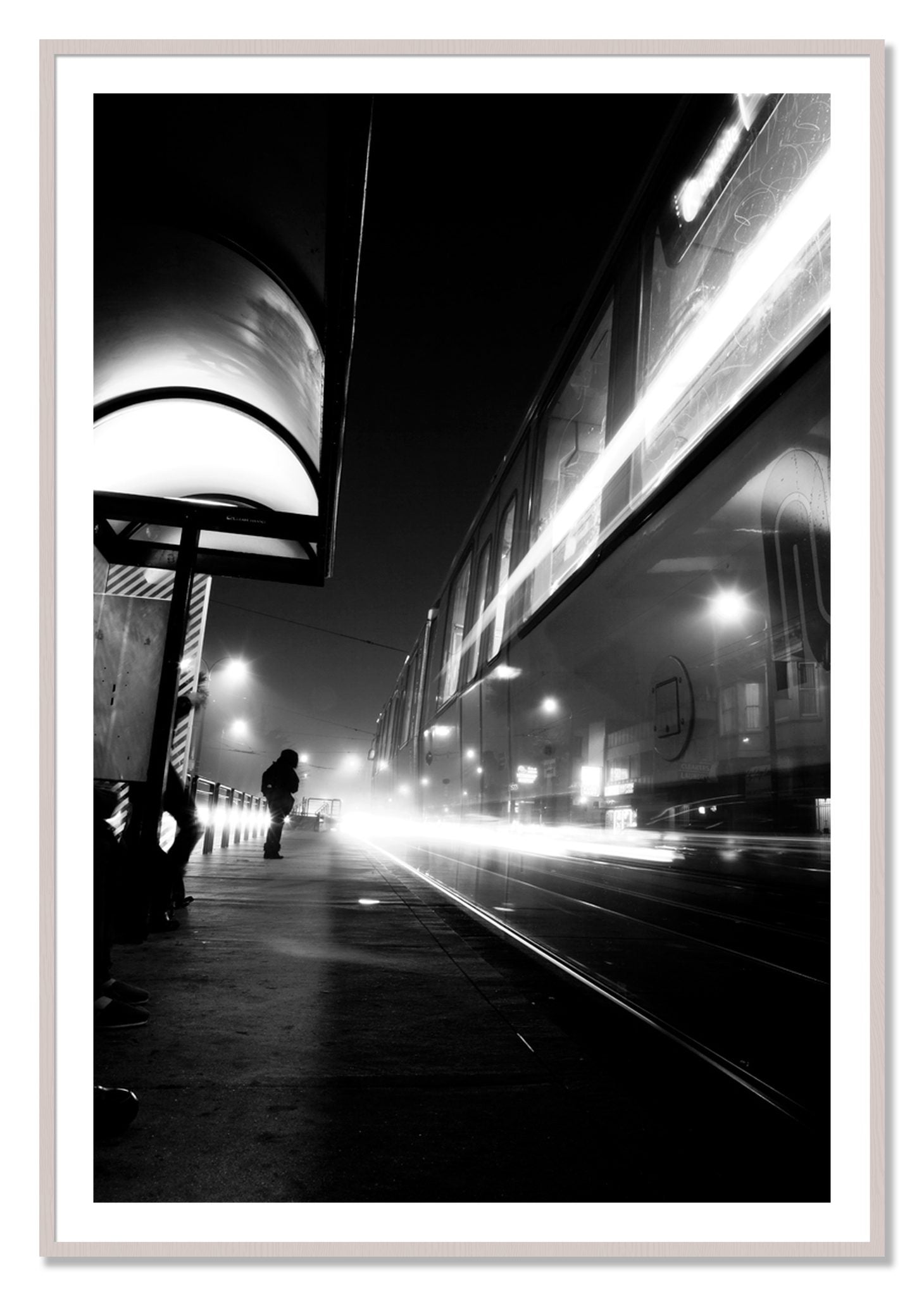 Framed photograph of Ghost Train by Dylan Ozanich, White Maple frame, Borders