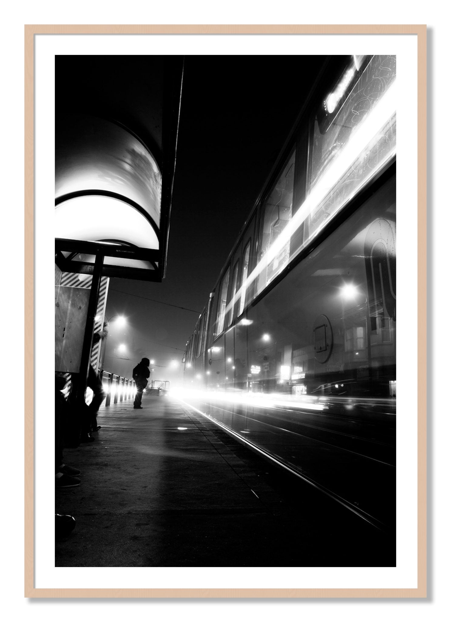 Framed photograph of Ghost Train by Dylan Ozanich, Maple frame, Borders