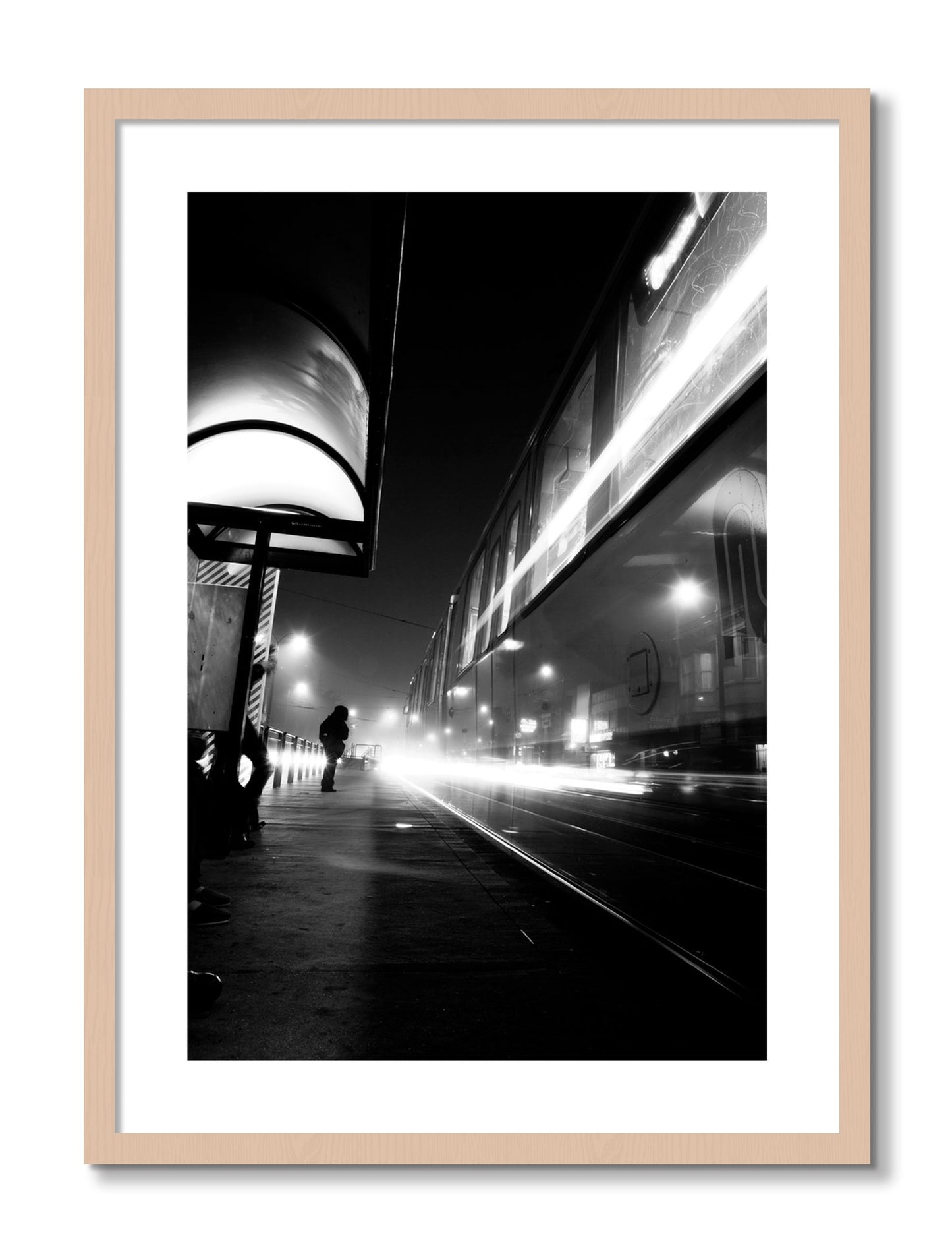 Framed photograph of Ghost Train by Dylan Ozanich, Maple frame, Borders