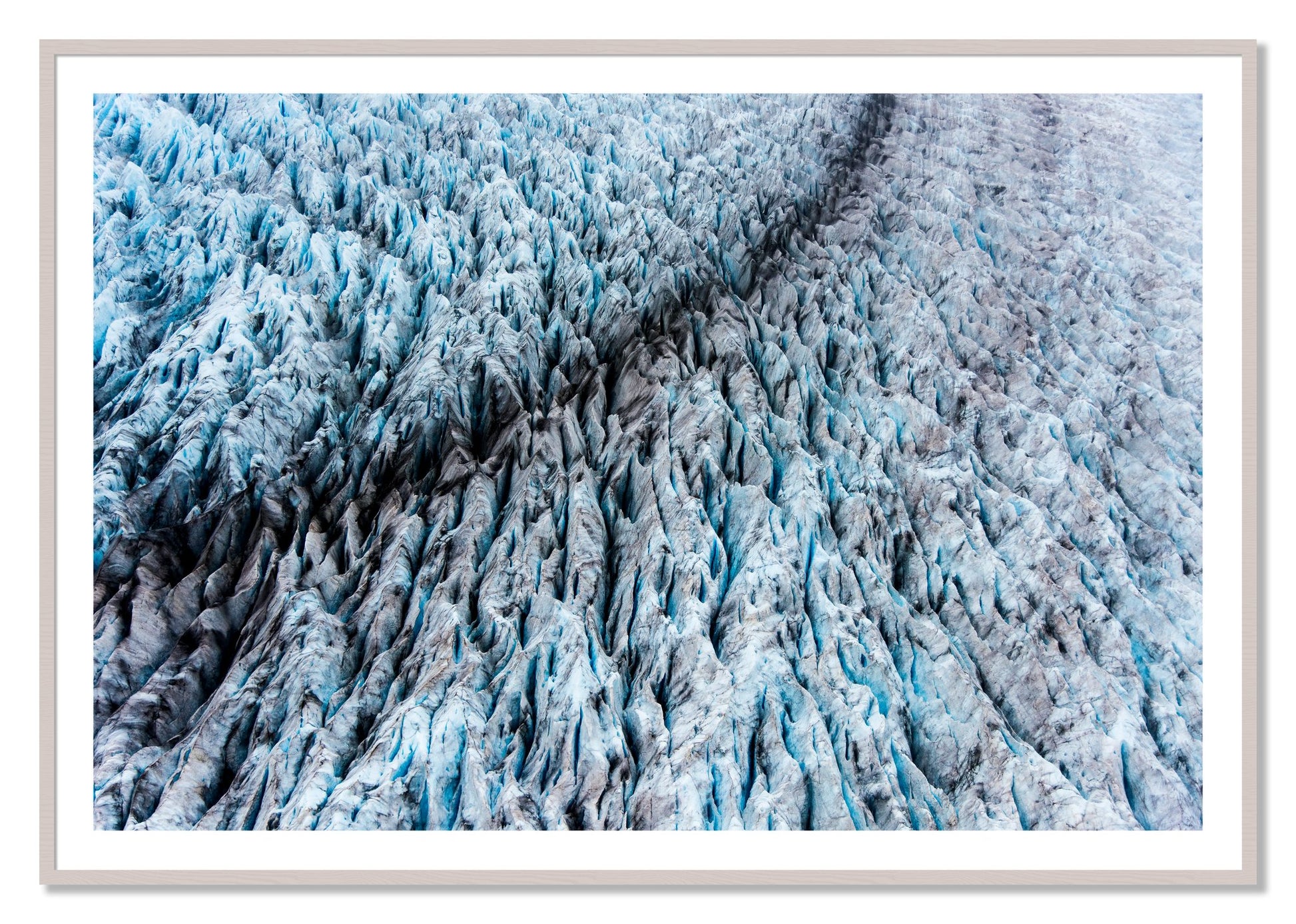Framed photograph of Glacier by Dylan Ozanich, White Maple frame, Borders