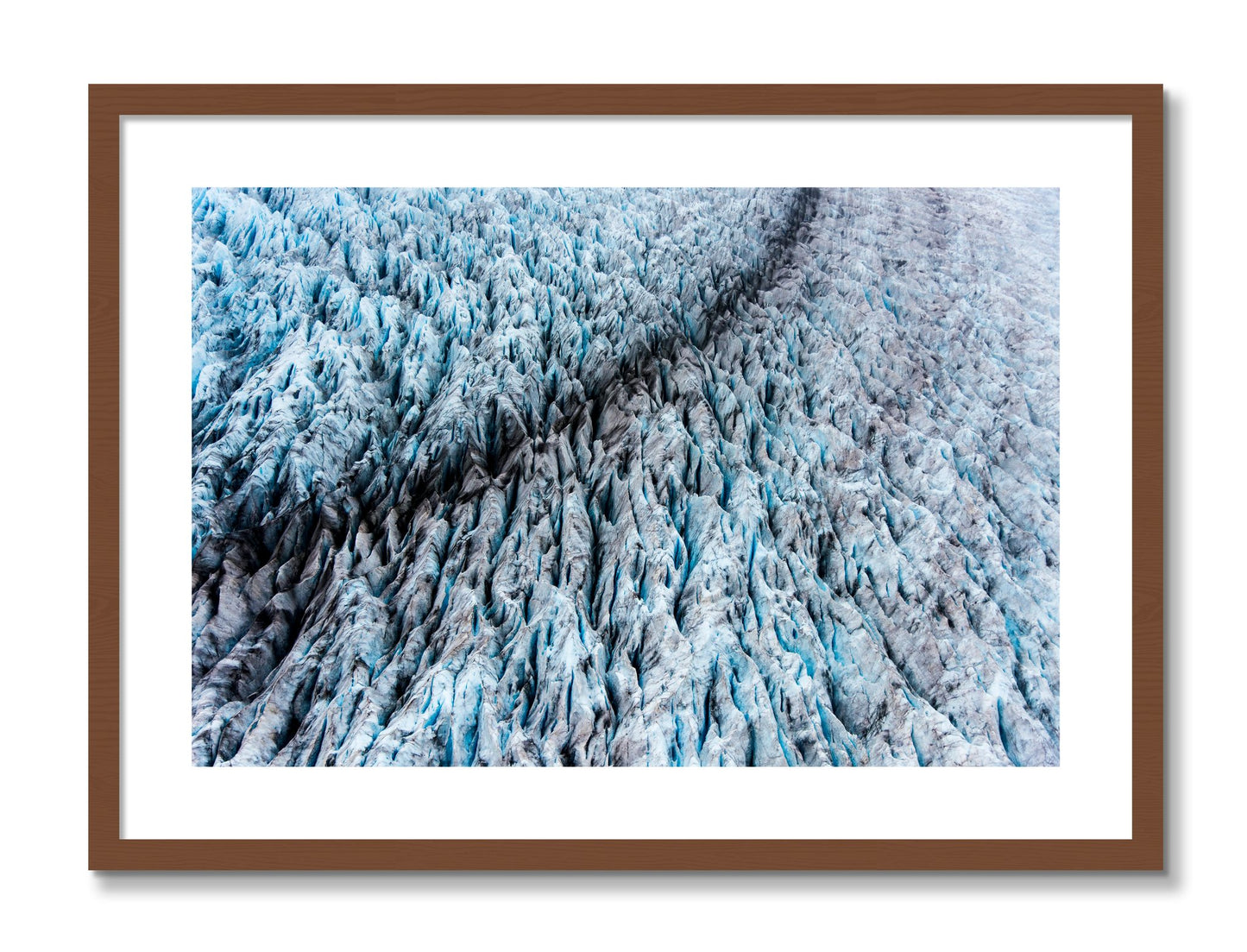 Framed photograph of Glacier by Dylan Ozanich, Walnut frame, Borders