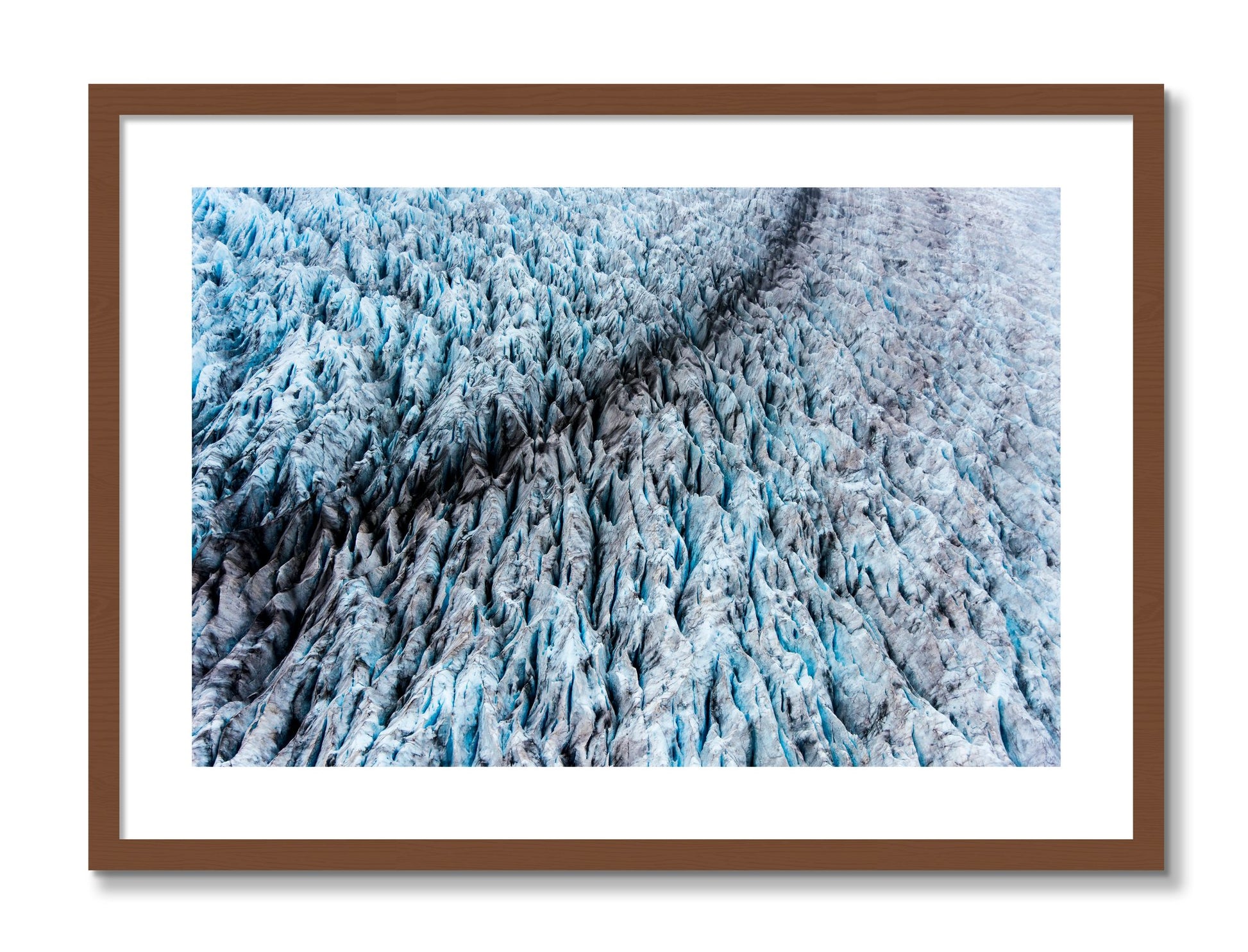 Framed photograph of Glacier by Dylan Ozanich, Walnut frame, Borders