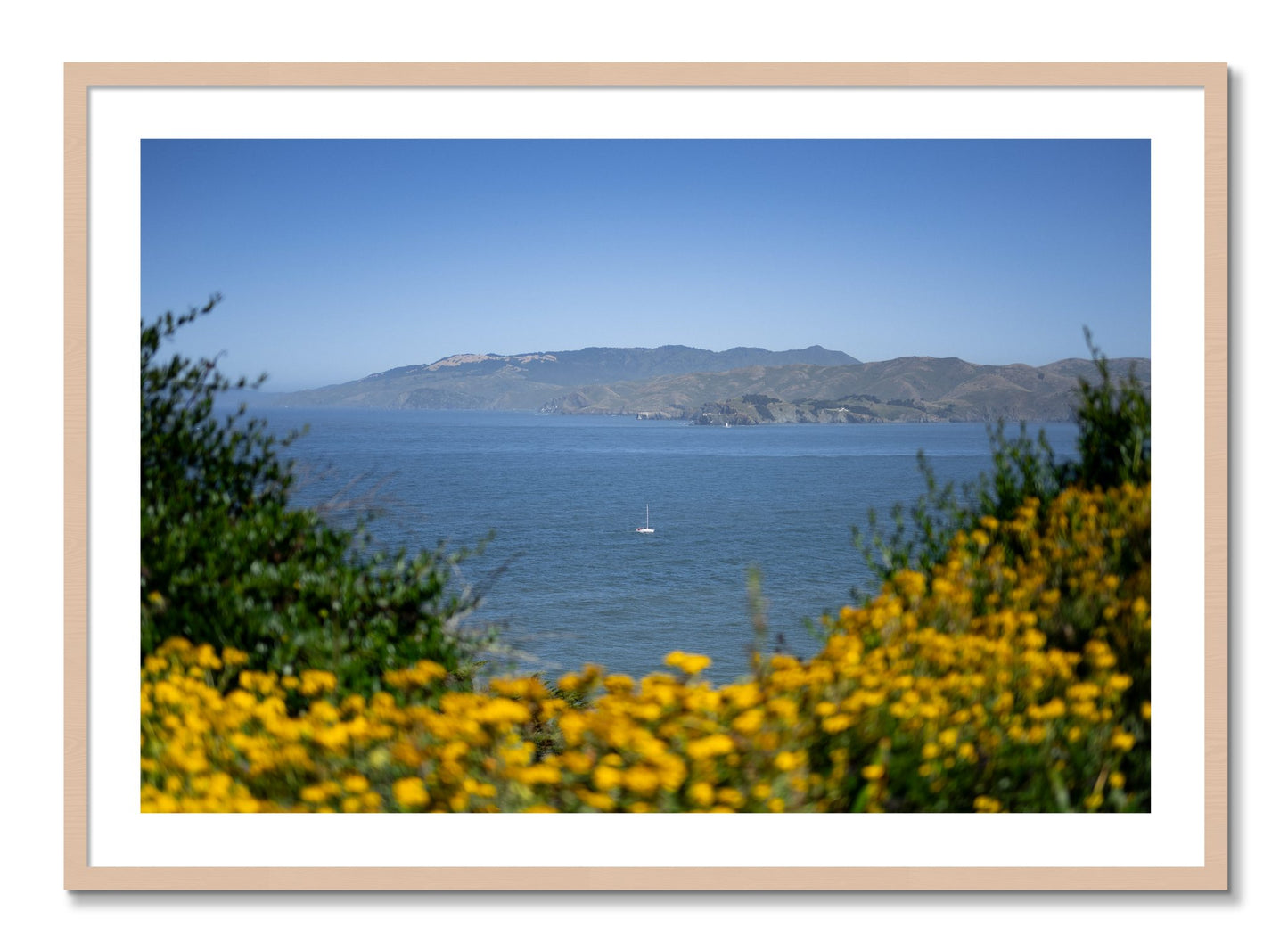 Framed photograph of Golden Bay by Dylan Ozanich, Maple frame, Borders