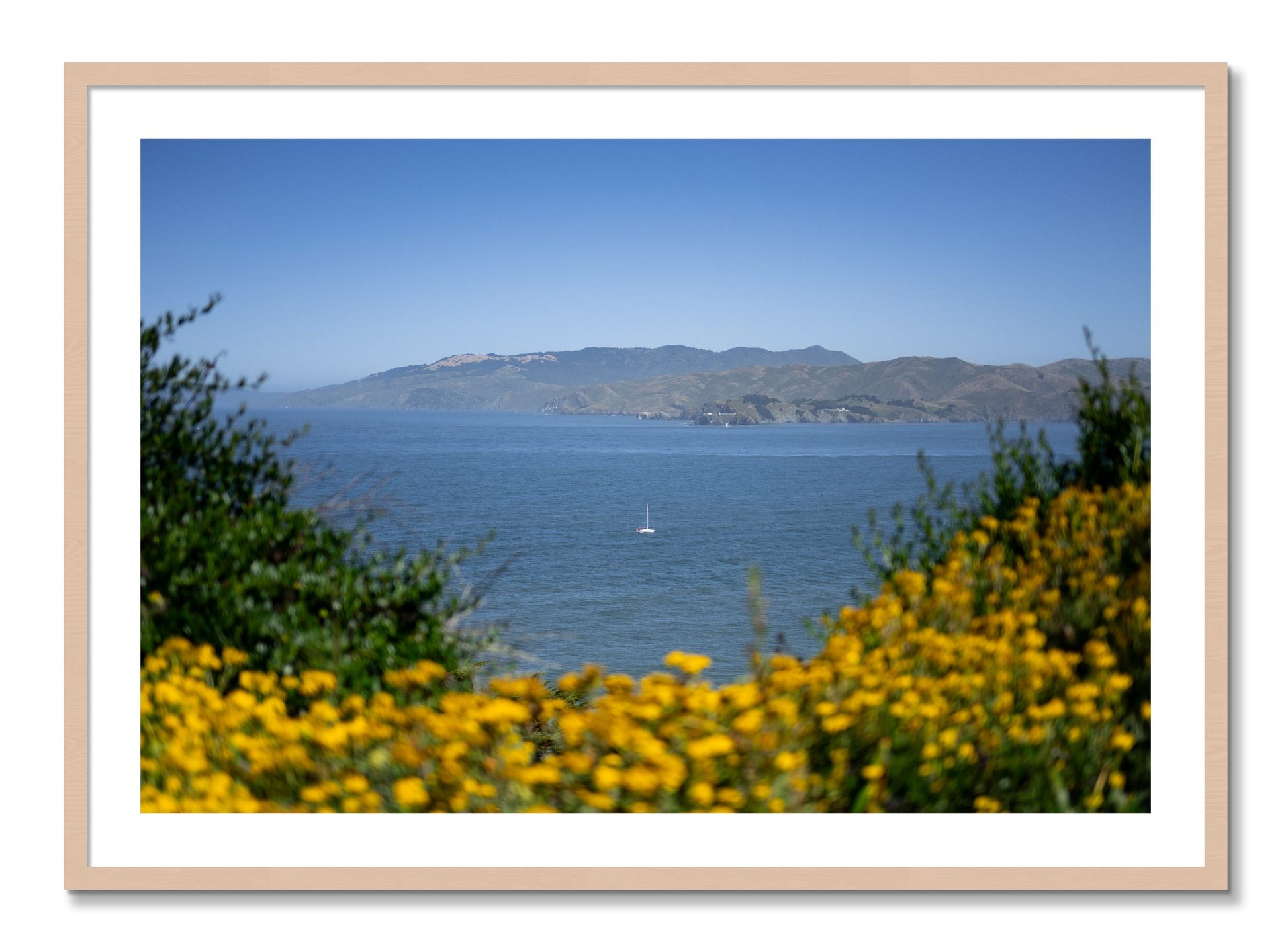 Framed photograph of Golden Bay by Dylan Ozanich, Maple frame, Borders
