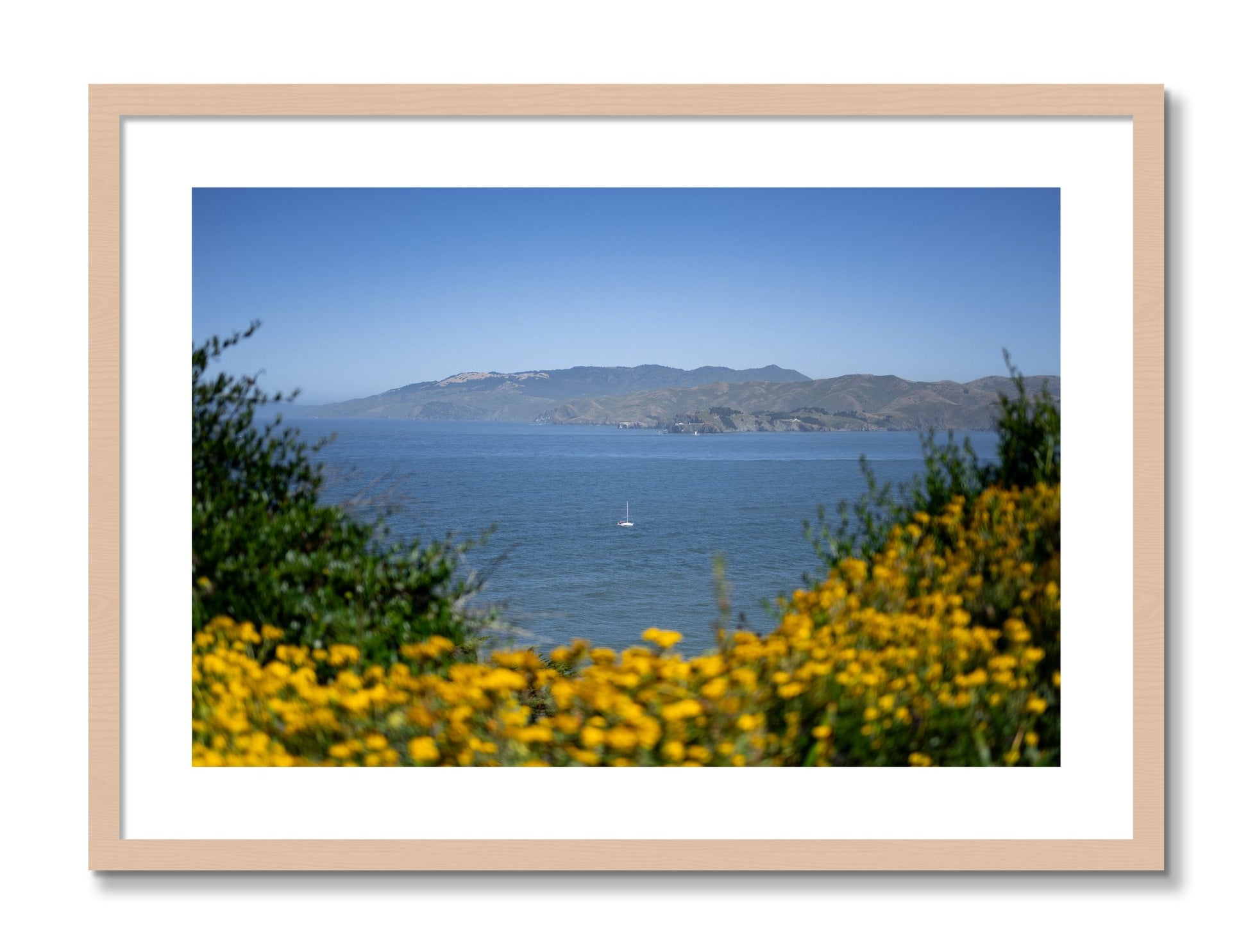 Framed photograph of Golden Bay by Dylan Ozanich, Maple frame, Borders