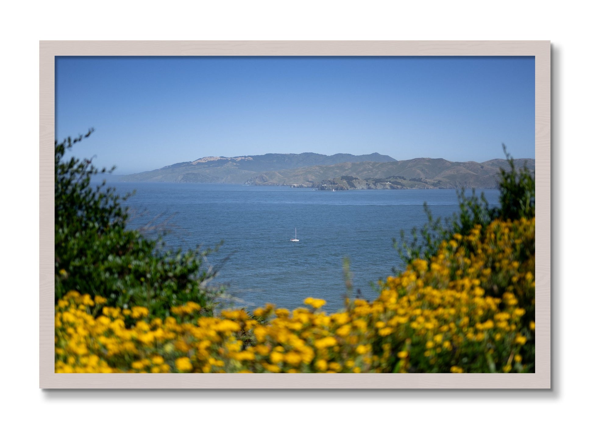 Framed photograph of Golden Bay by Dylan Ozanich, White Maple frame, Full Bleed