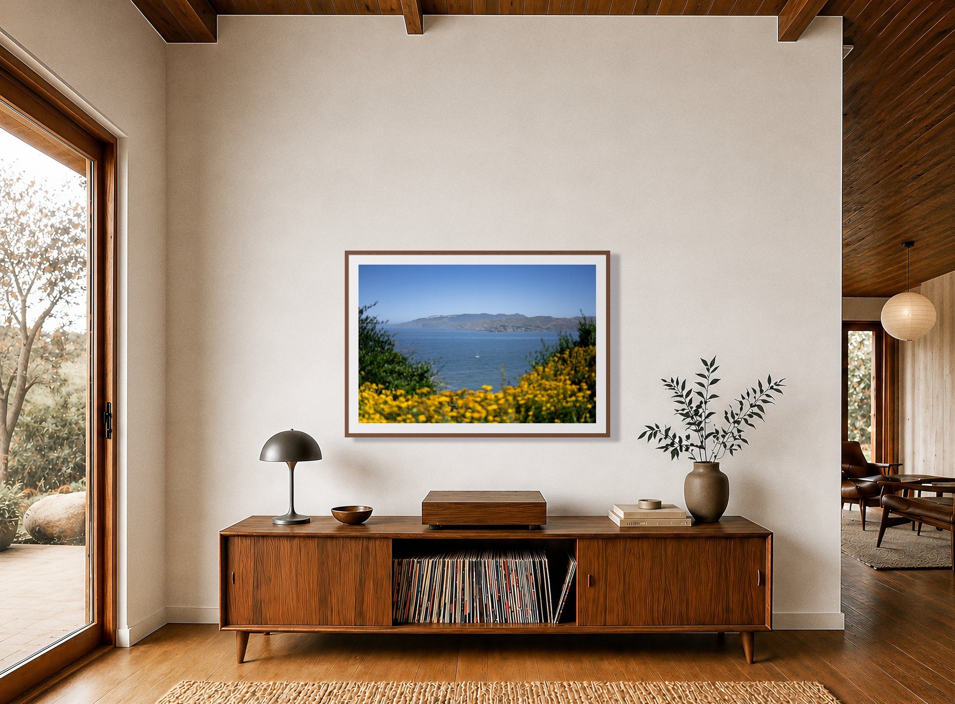 Framed photograph of Golden Bay by Dylan Ozanich displayed on a wall