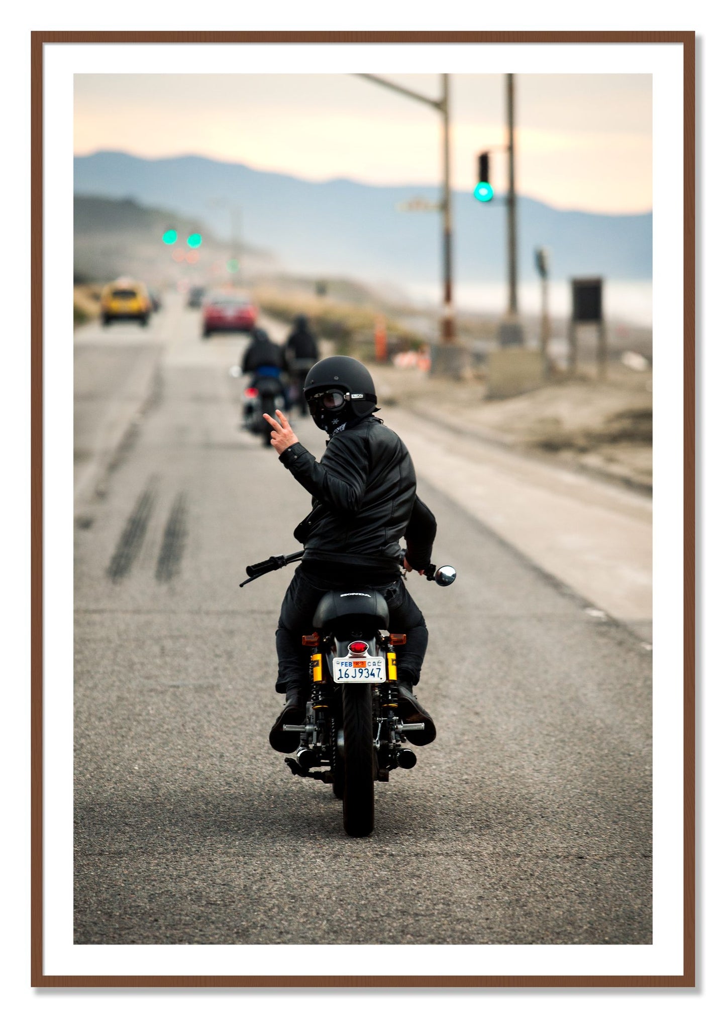 Framed photograph of Great Highway Riding by Dylan Ozanich, Walnut frame, Borders