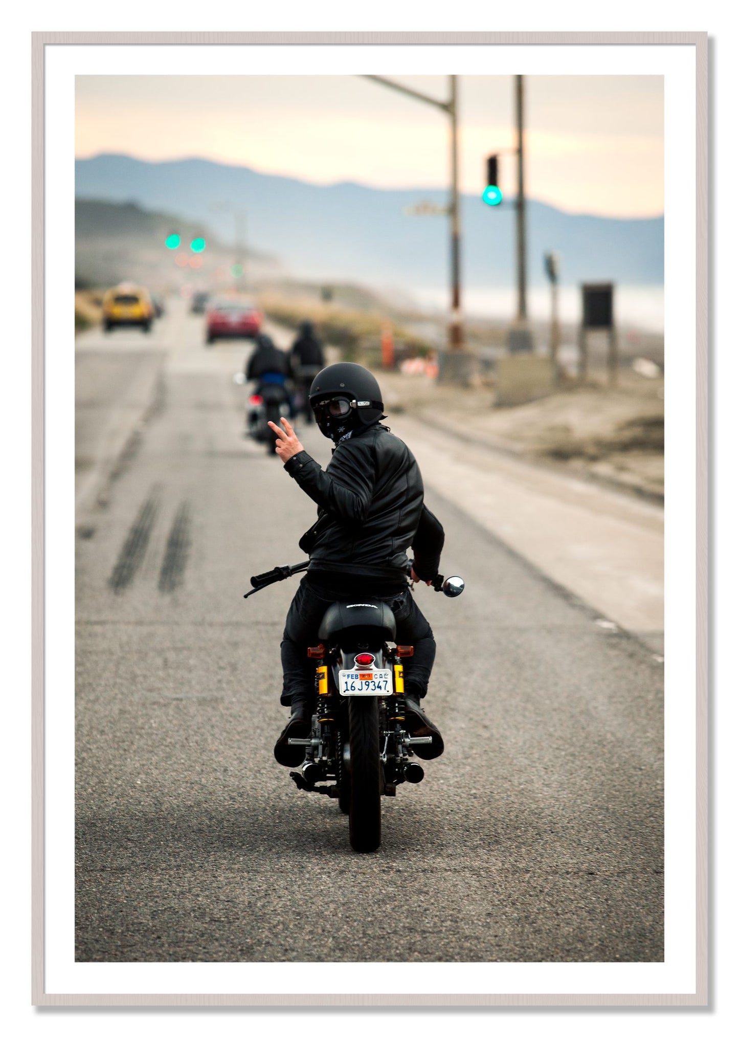 Framed photograph of Great Highway Riding by Dylan Ozanich, White Maple frame, Borders