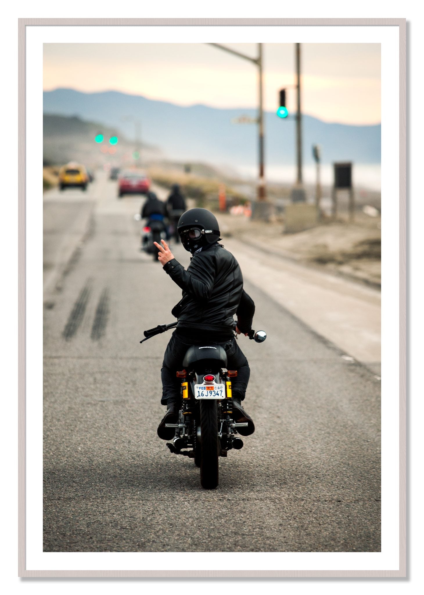 Framed photograph of Great Highway Riding by Dylan Ozanich, White Maple frame, Borders