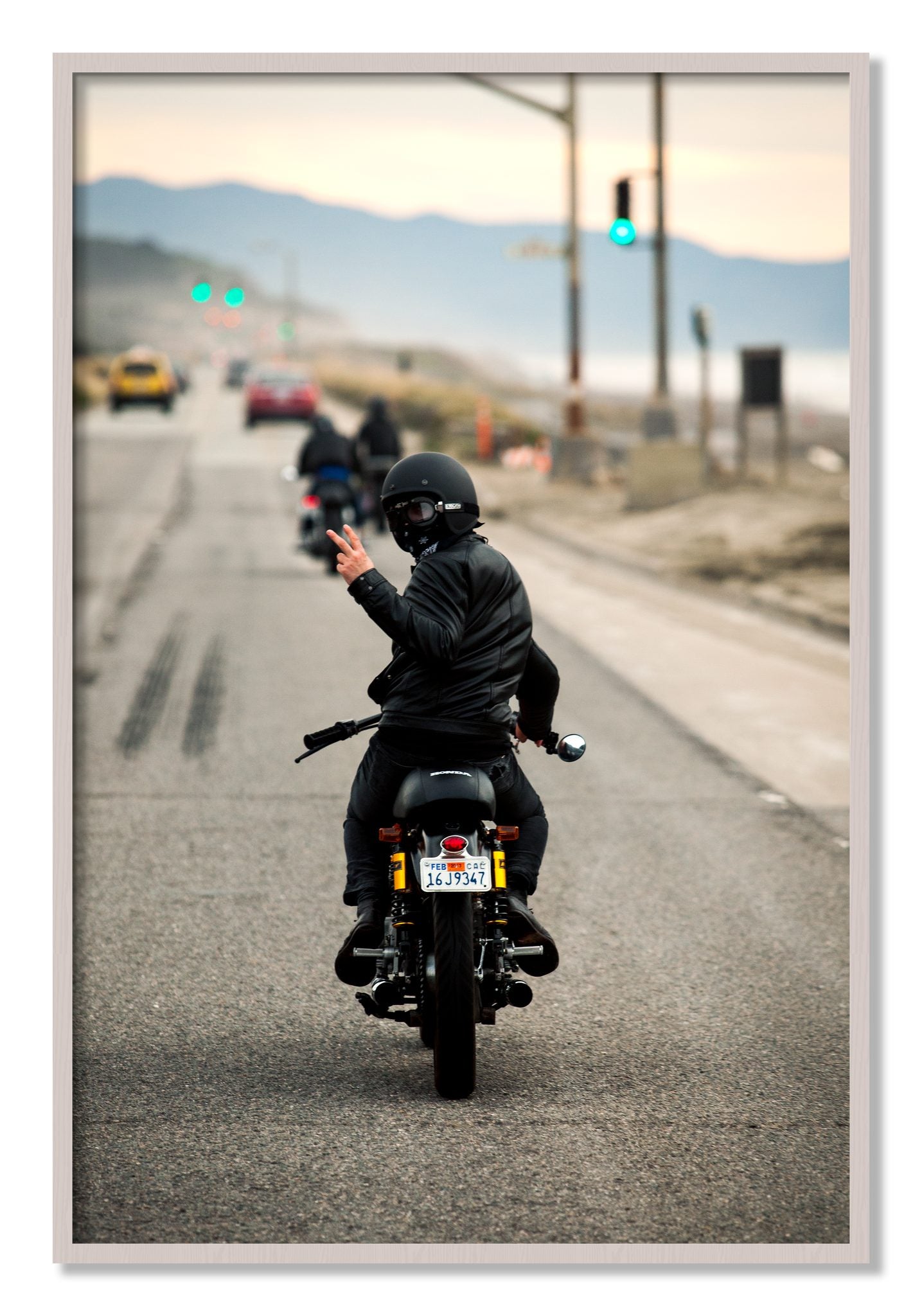Framed photograph of Great Highway Riding by Dylan Ozanich, White Maple frame, Full Bleed