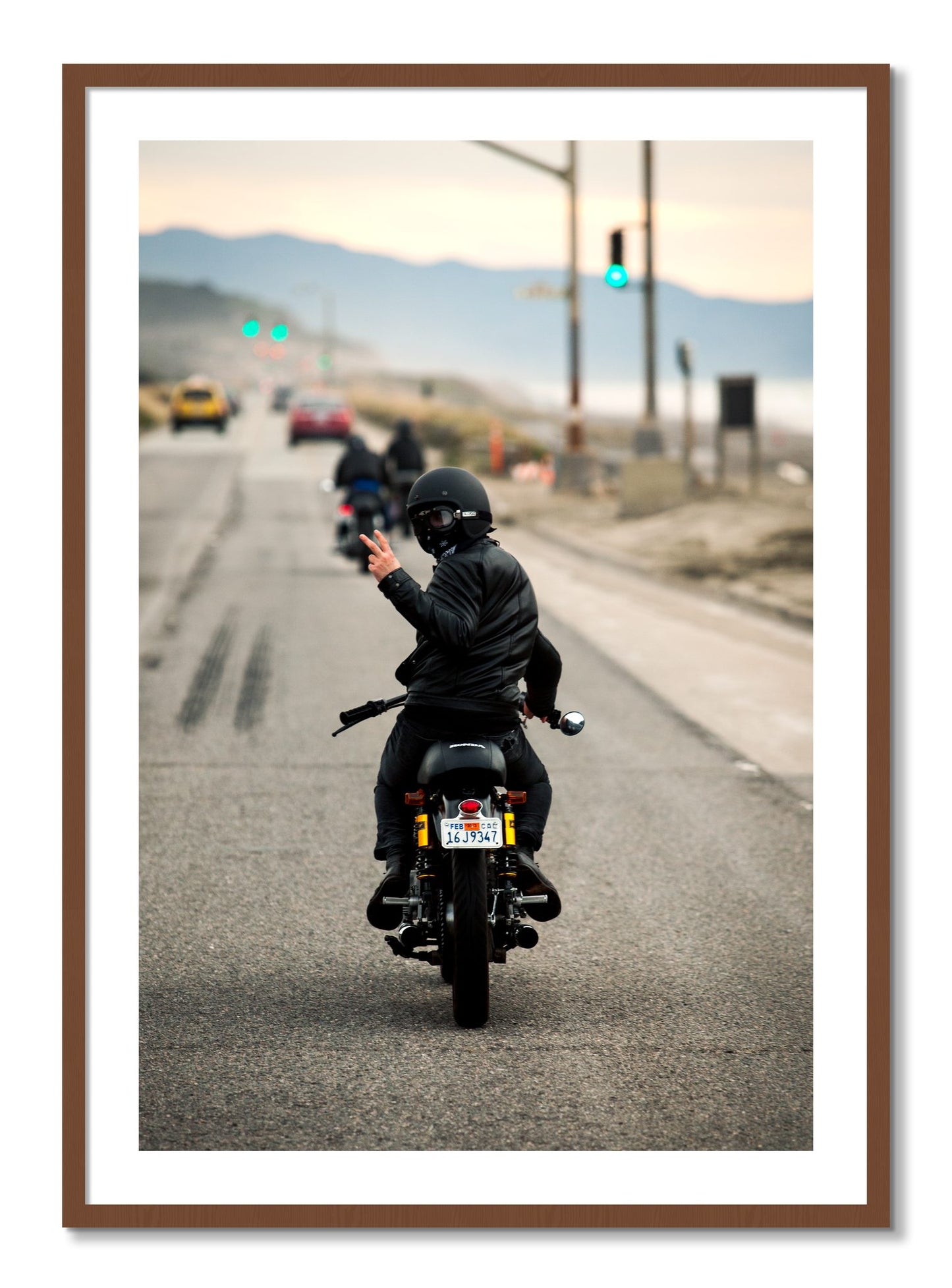 Framed photograph of Great Highway Riding by Dylan Ozanich, Walnut frame, Borders