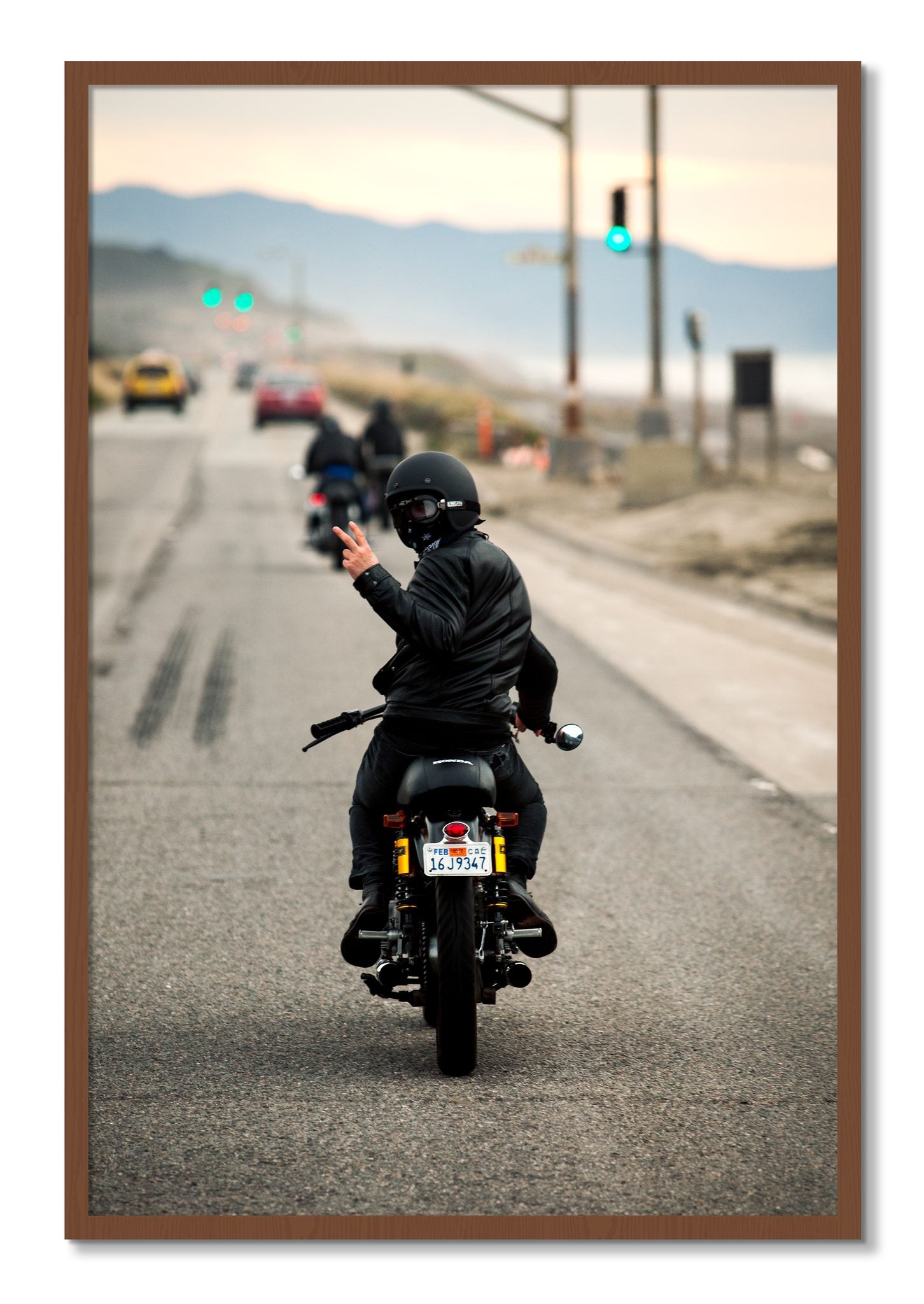 Framed photograph of Great Highway Riding by Dylan Ozanich, Walnut frame, Full Bleed
