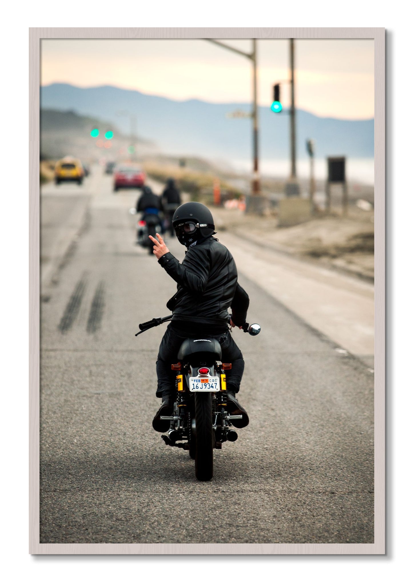 Framed photograph of Great Highway Riding by Dylan Ozanich, White Maple frame, Full Bleed