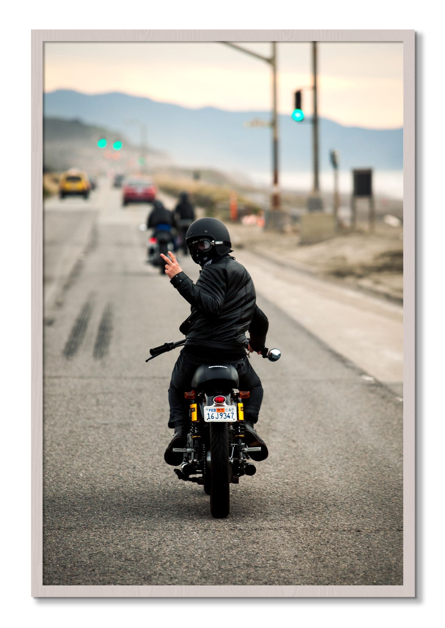 Framed photograph of Great Highway Riding by Dylan Ozanich, White Maple frame, Full Bleed