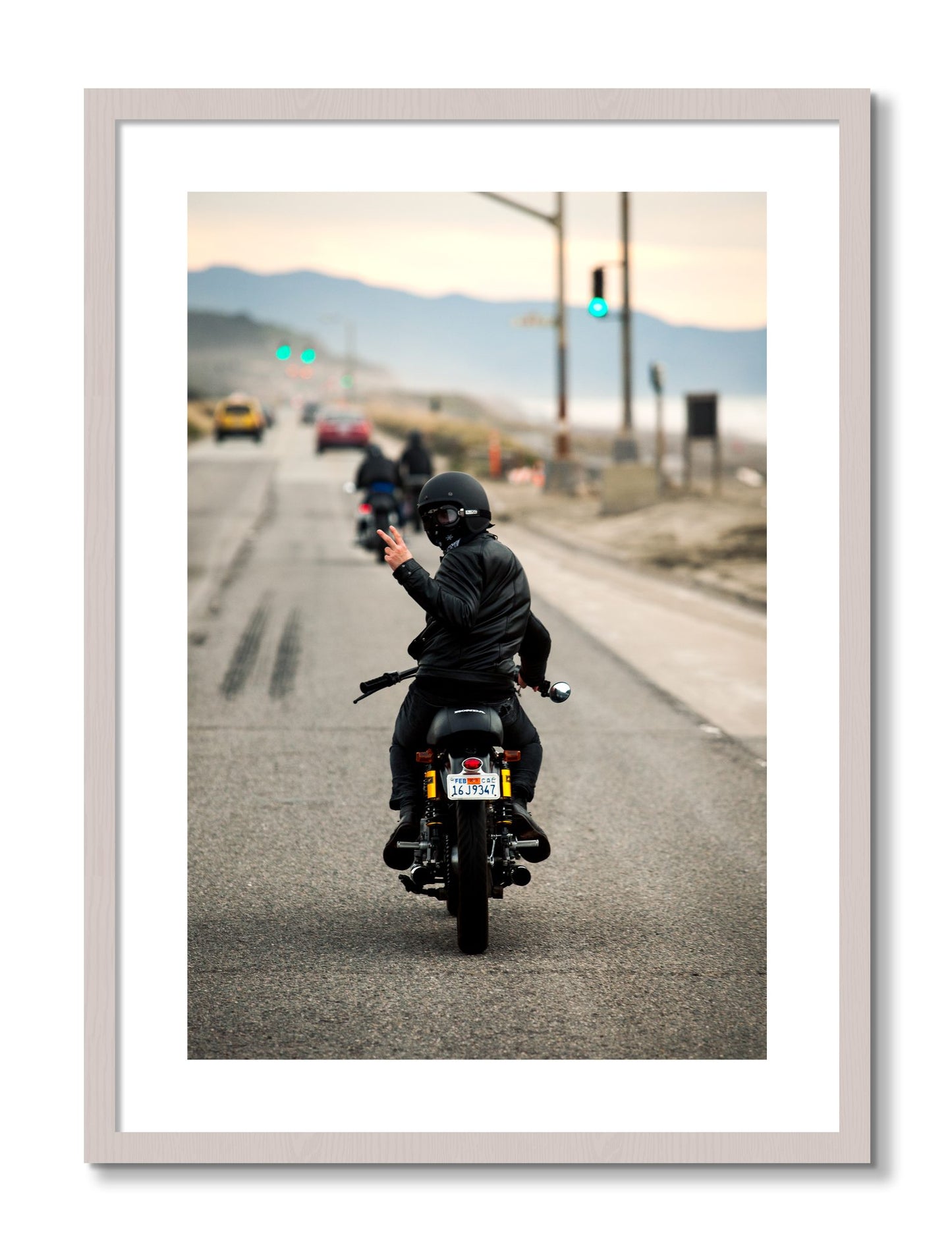 Framed photograph of Great Highway Riding by Dylan Ozanich, White Maple frame, Borders