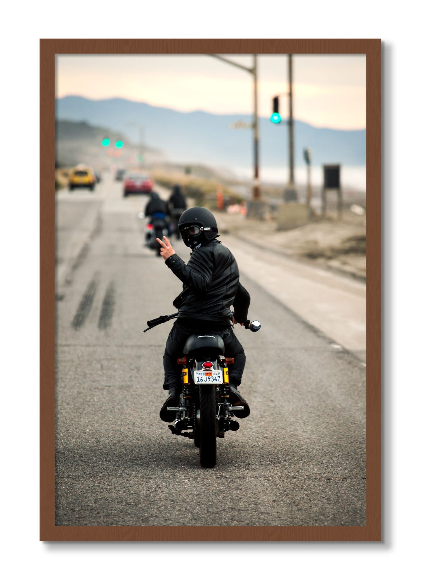 Framed photograph of Great Highway Riding by Dylan Ozanich, Walnut frame, Full Bleed