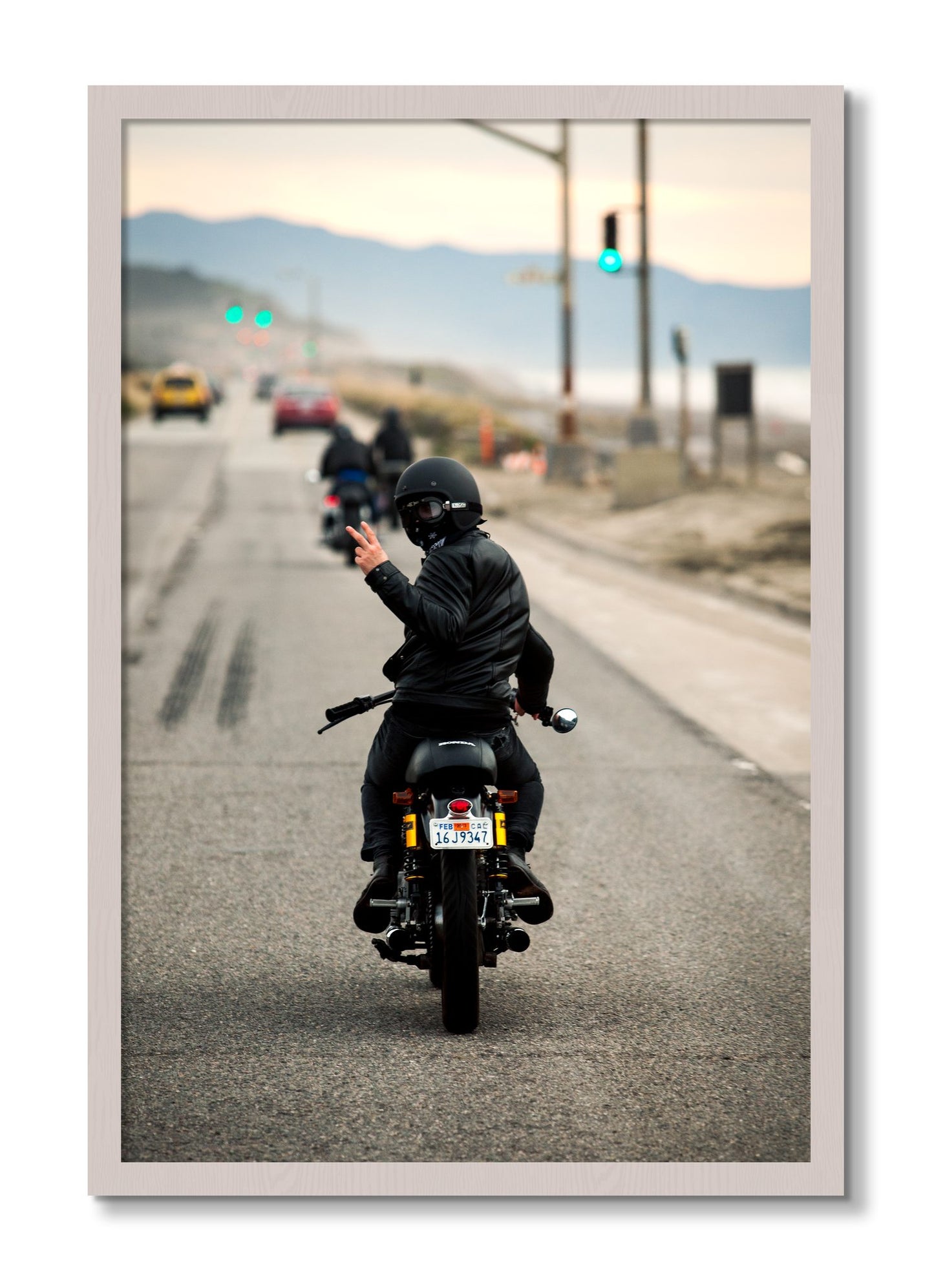 Framed photograph of Great Highway Riding by Dylan Ozanich, White Maple frame, Full Bleed