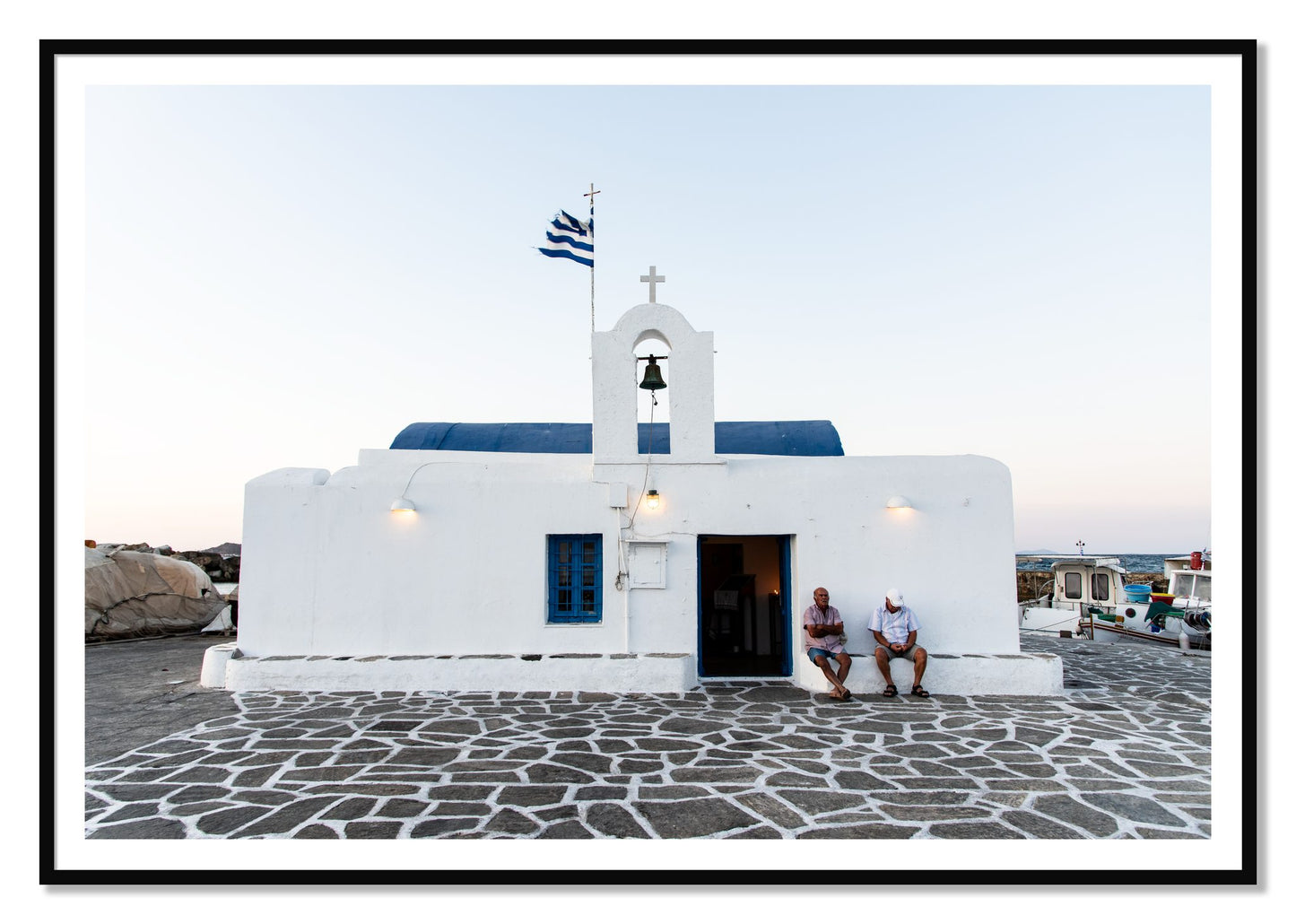 Greek Boathouse by Dylan Ozanich, 48×72 print with a White Border in a Black frame