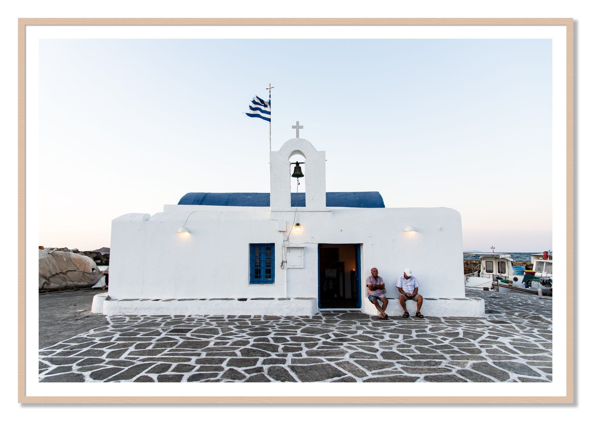 Greek Boathouse by Dylan Ozanich, 48×72 print with a White Border in a Maple frame